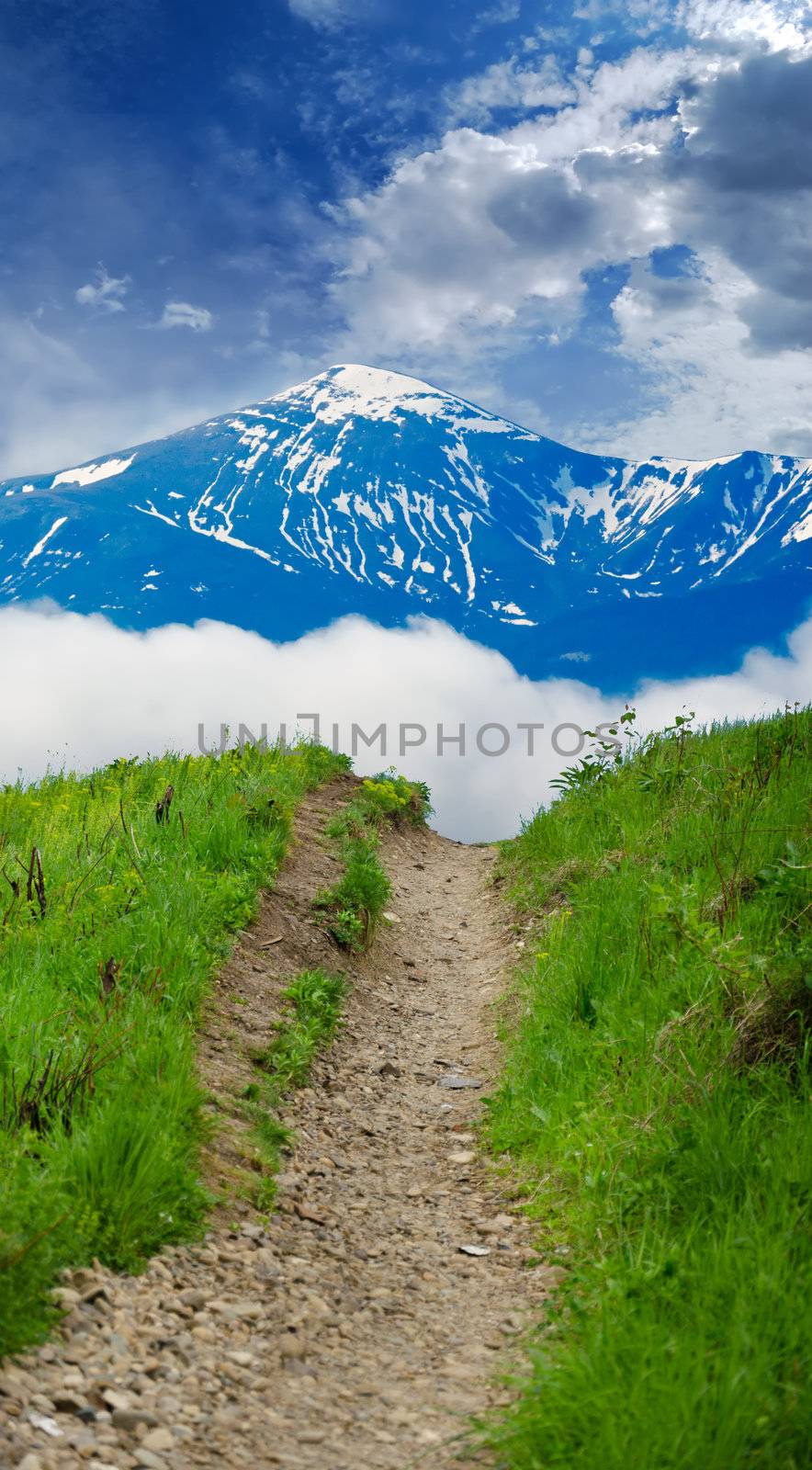 footpath on the hill amid the scenic sky