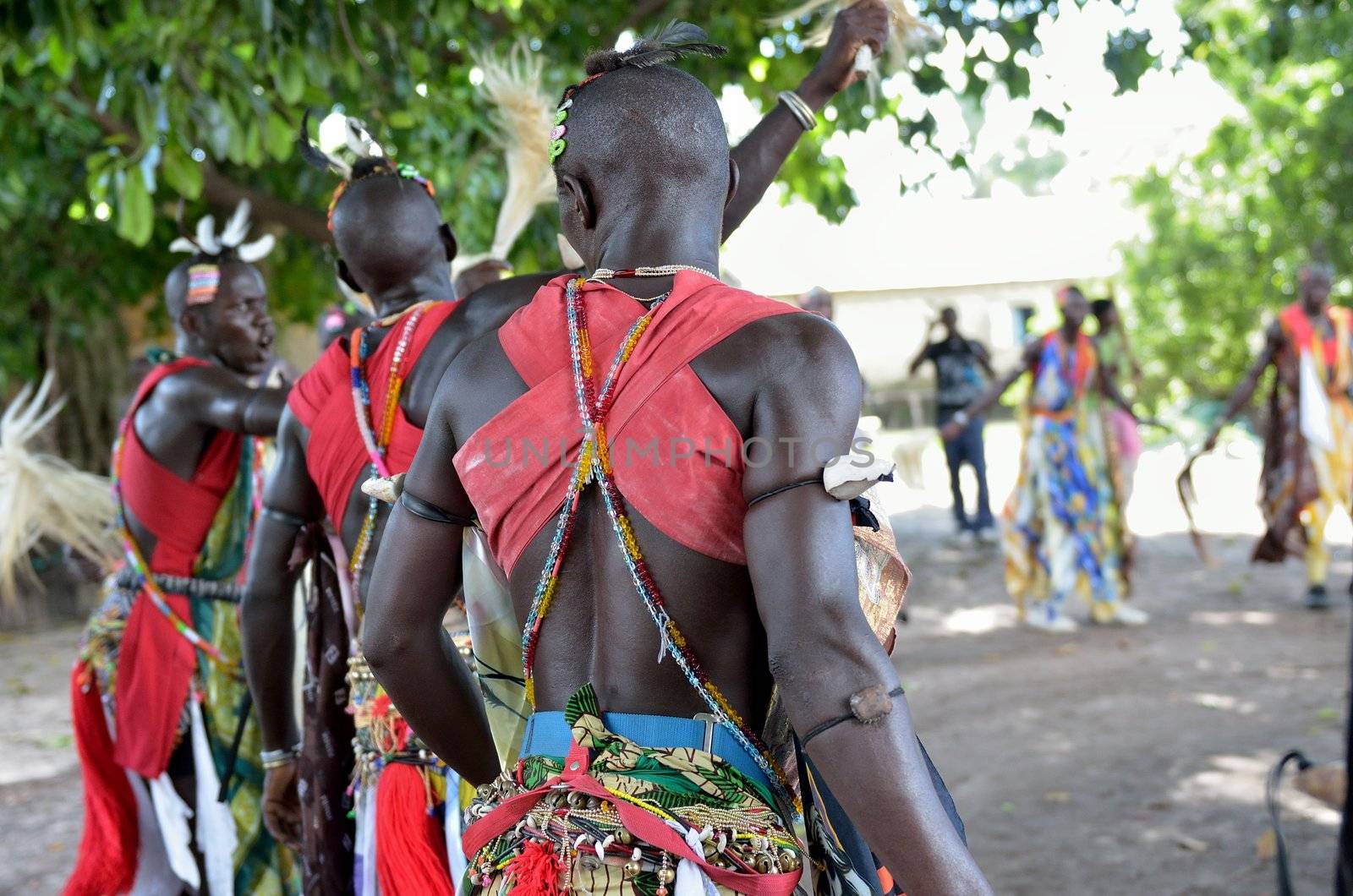 Kartiak, Senegal- September 25,2012: African men dance in the party of initiation. This ceremony is performed every 30 years in the village of Kartiak,