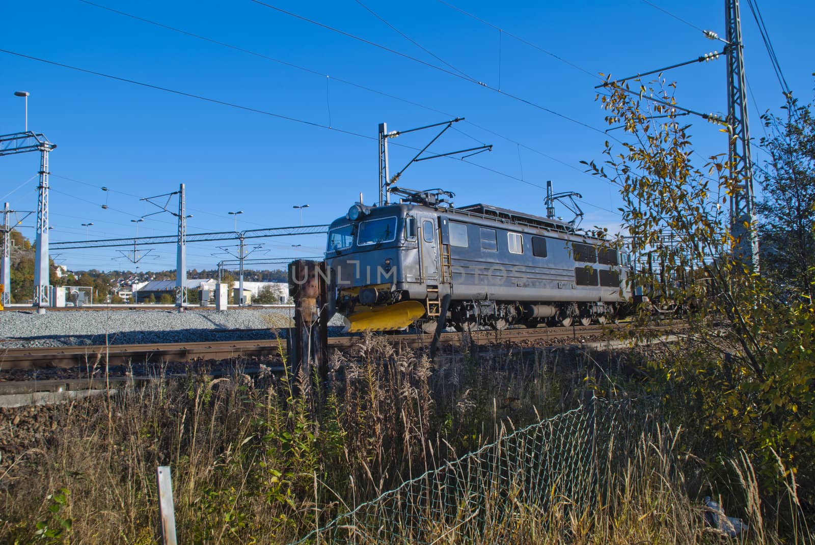 El. 14 is an electric locomotive that is now used by CargoNet to pull freight trains in Norway. El 14 has also gone in person traffic at NSB, but as of today are all locomotives used by CargoNet. Picture is shot just off Halden railway station.
