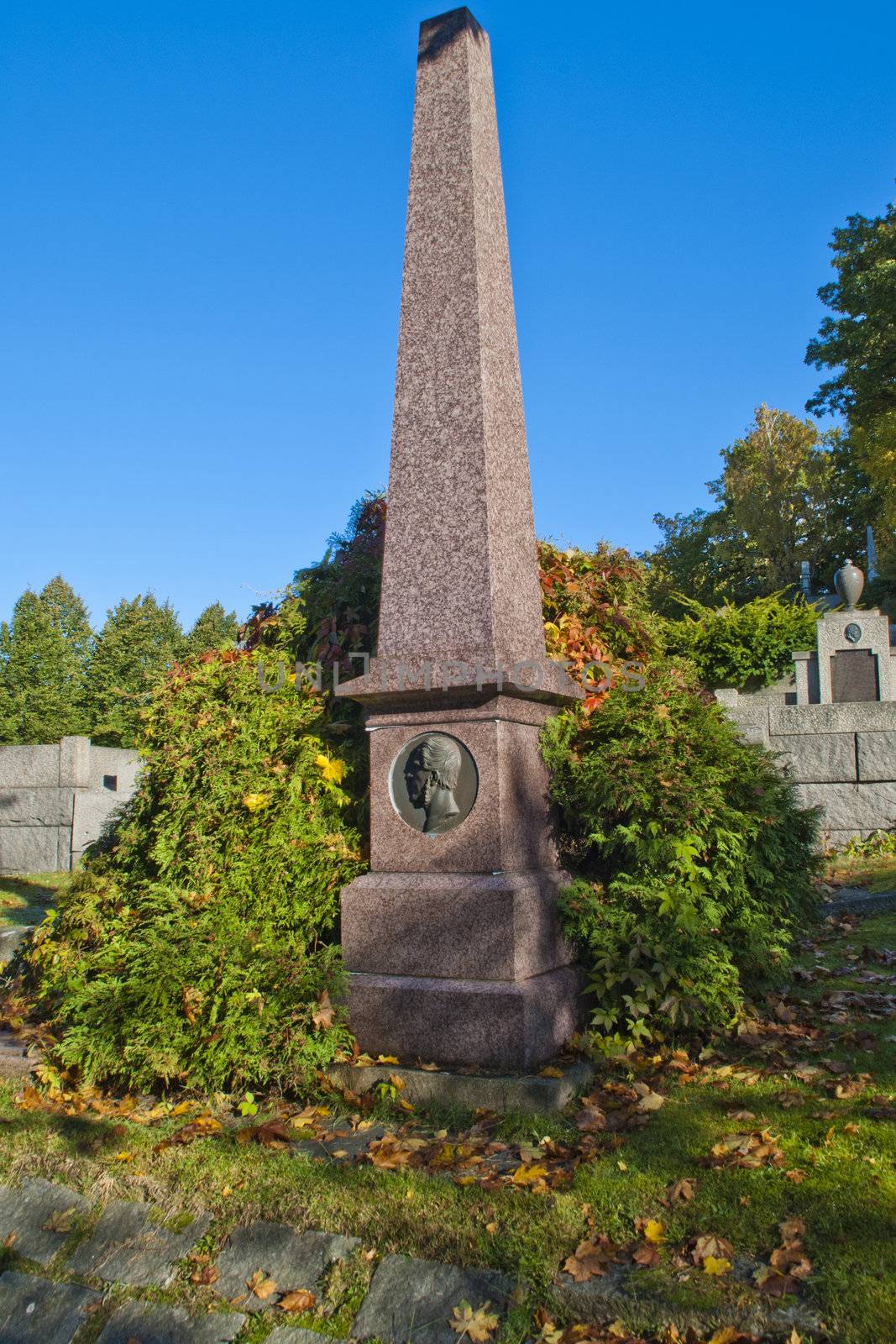 on the os cemetery in halden, there are several old grave monuments, image is shot inside the cemetery.