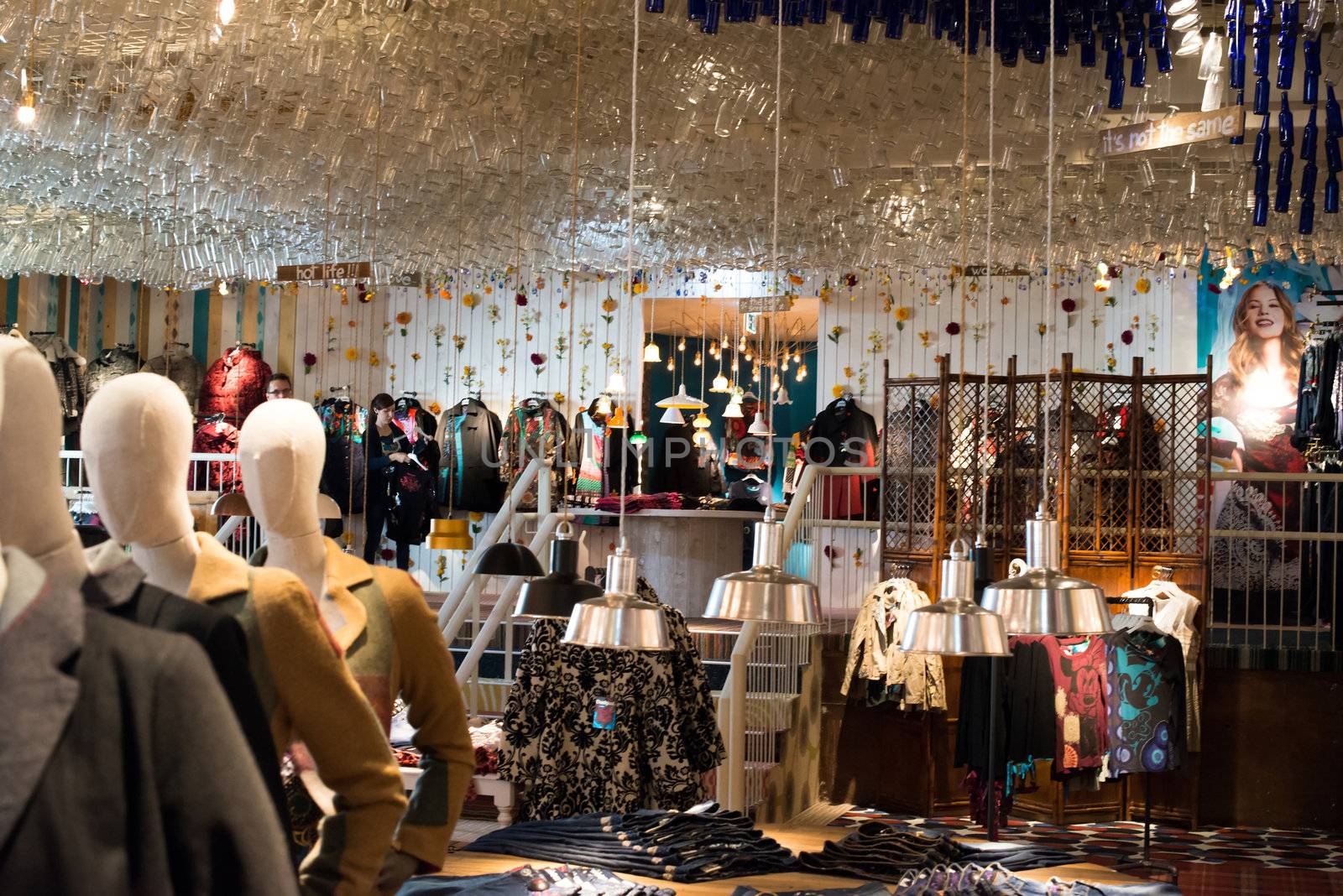 VIENNA - OCTOBER 6: The Desigual fashion store on October 6, 2012 in Mariahilfer Street in Vienna, Austria. Desigual was founded in 1984 and features about 200 stores in 65 countries in the meantime, offering a very colorful and extravagant fashion style which is reflected by the decoration and design of these stores.