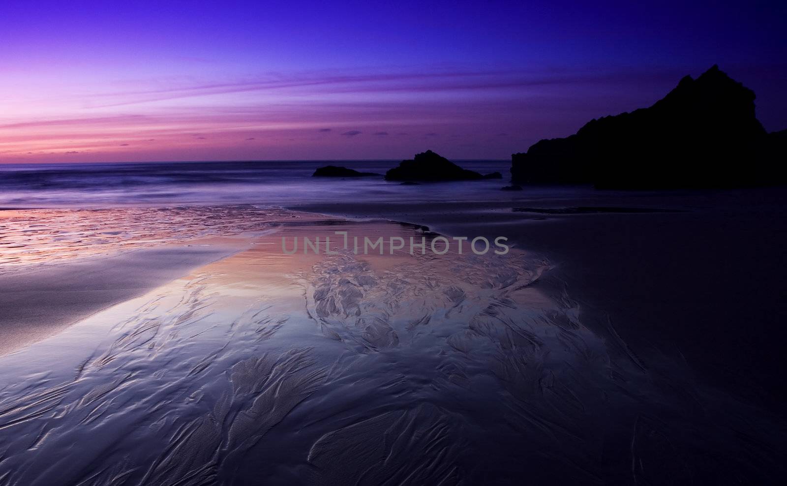 Bedruthan Steps, Cornwall, at sunset by olliemt