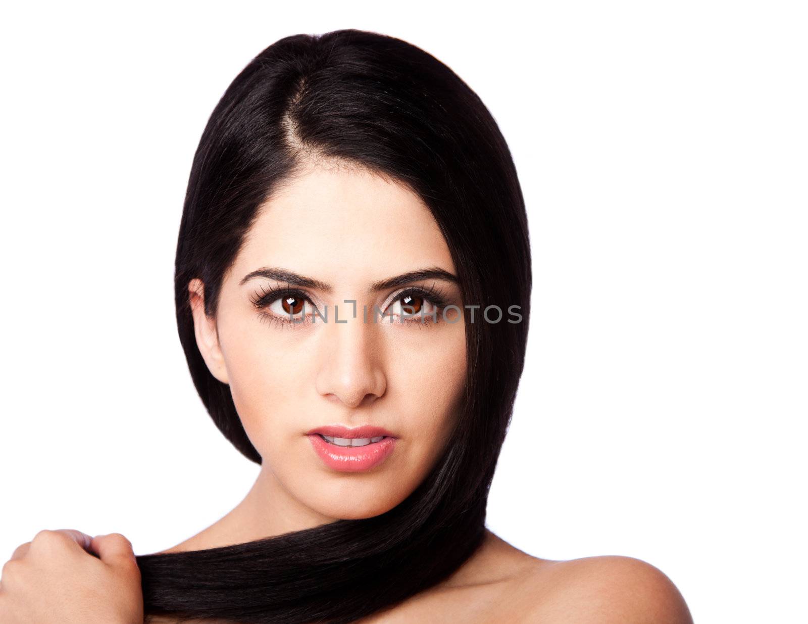 Beatiful healthy woman face with straight long hair wrapped around head with clear skin - hair styling concept, isolated.