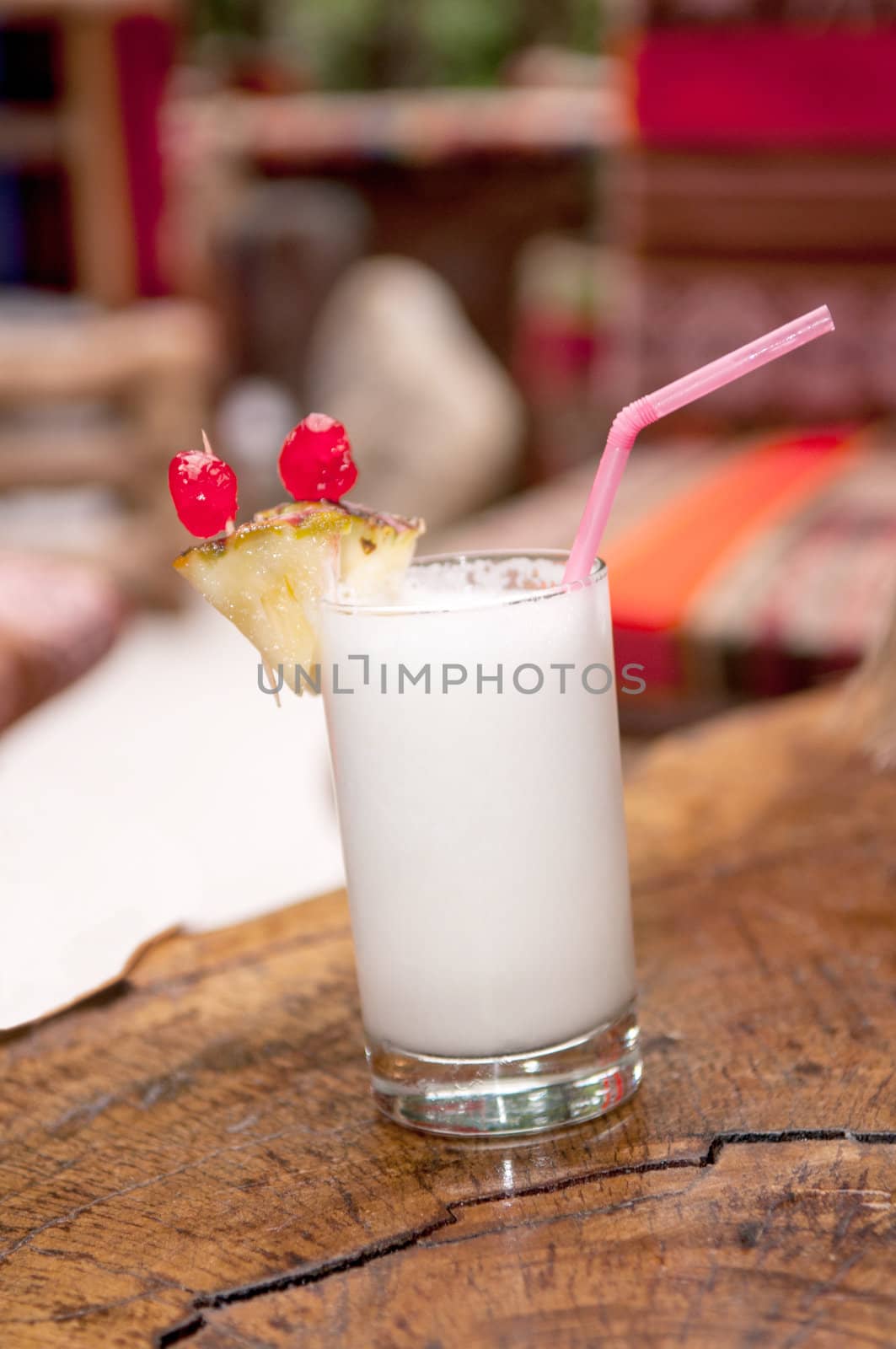 Pinacolada milk cocktail on table in restaurant
