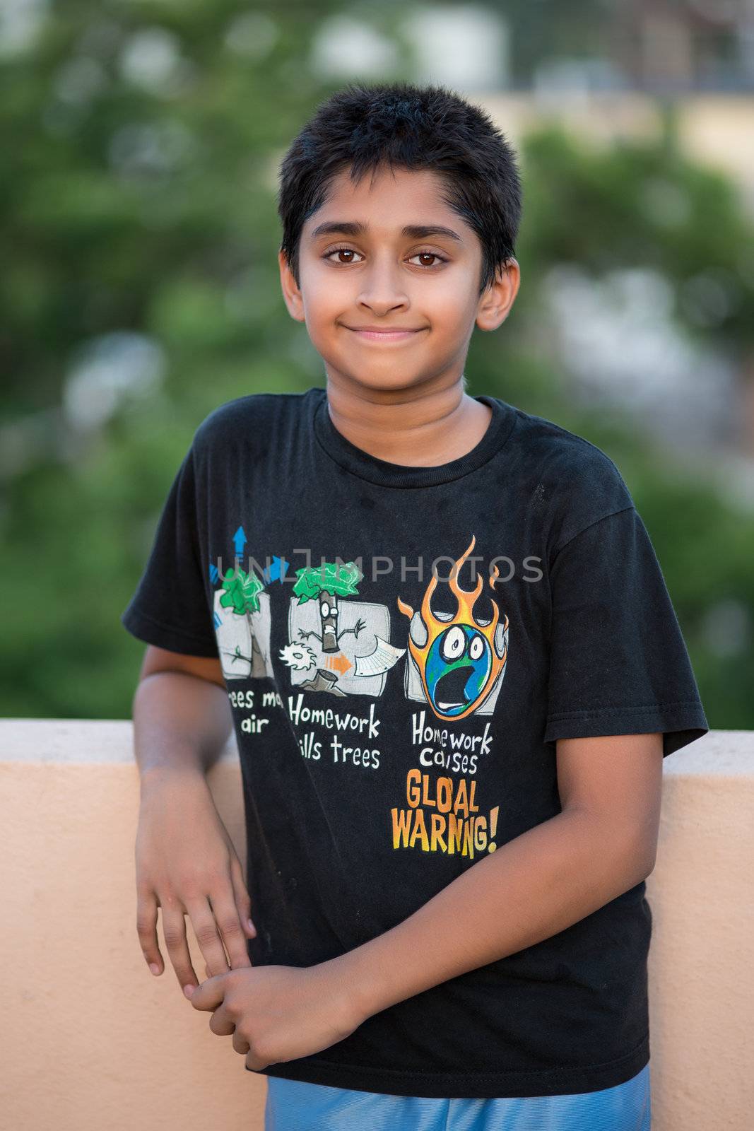 Handsome Indian toddler standing outdoor smiling