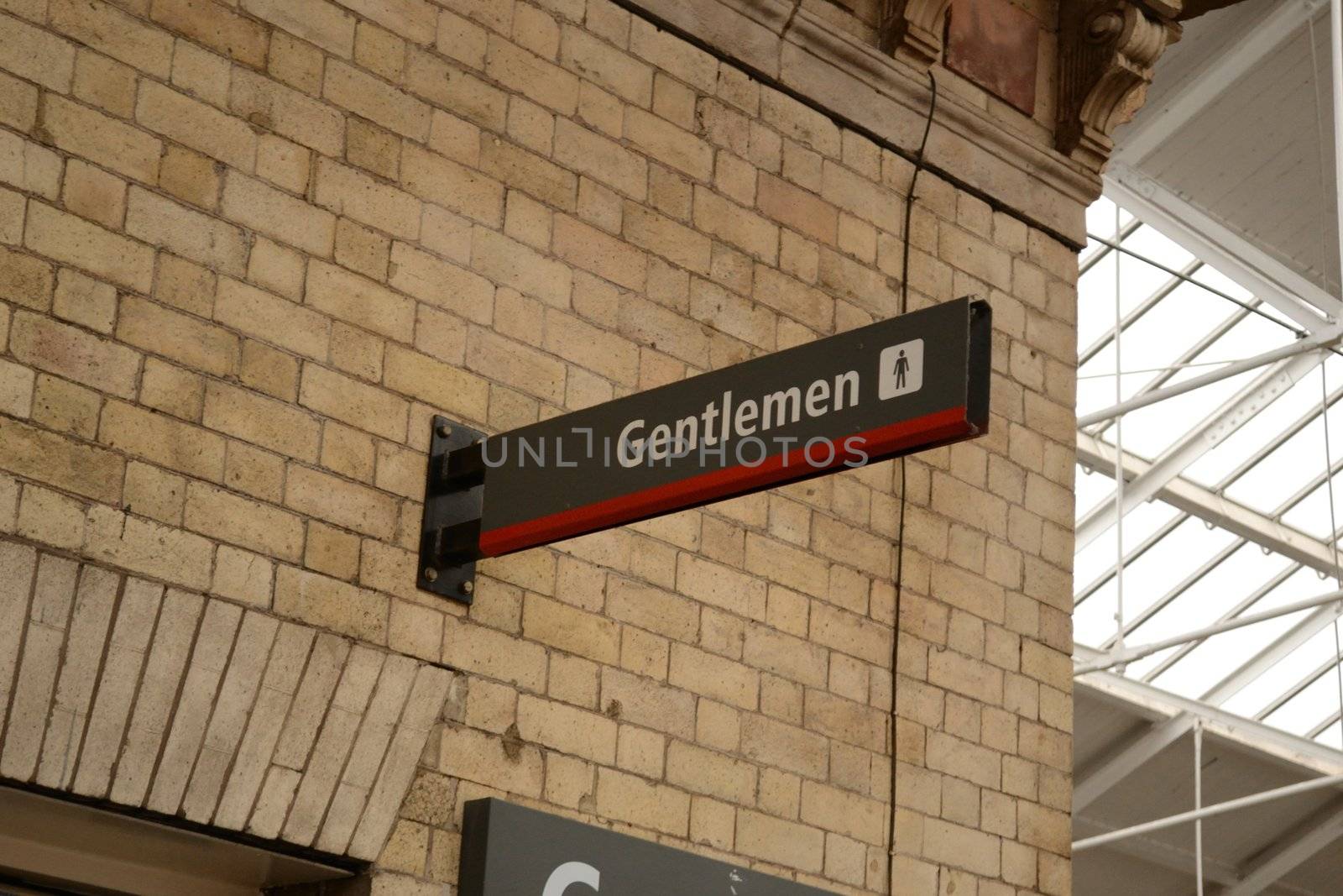 gentlemen sign of toilet at railway station