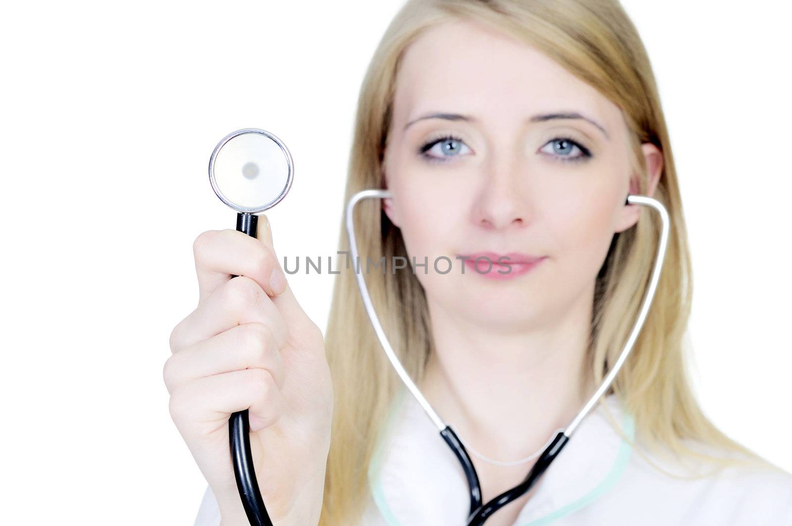Smiling doctor in white coat using stethoscope isolated by mmajk