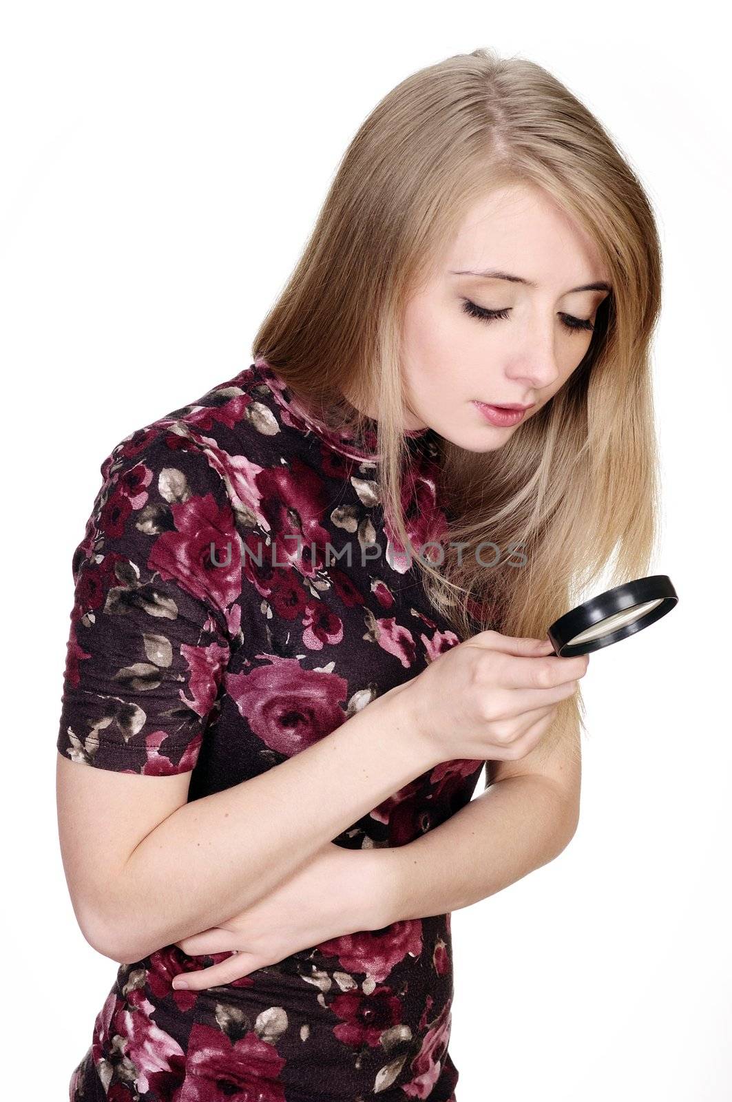 Picture of beautiful woman with magnifying glass