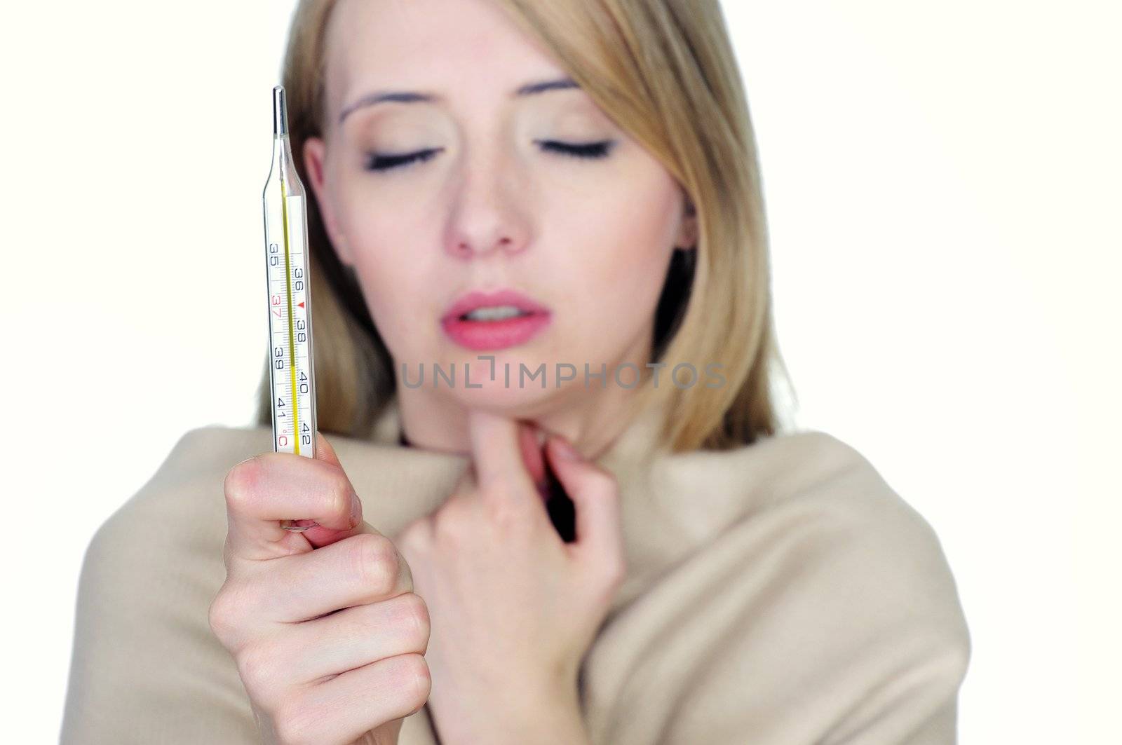 Woman with high temperature holding a thermometer isolated on white.







Woman with high temperature holding a thermometer
