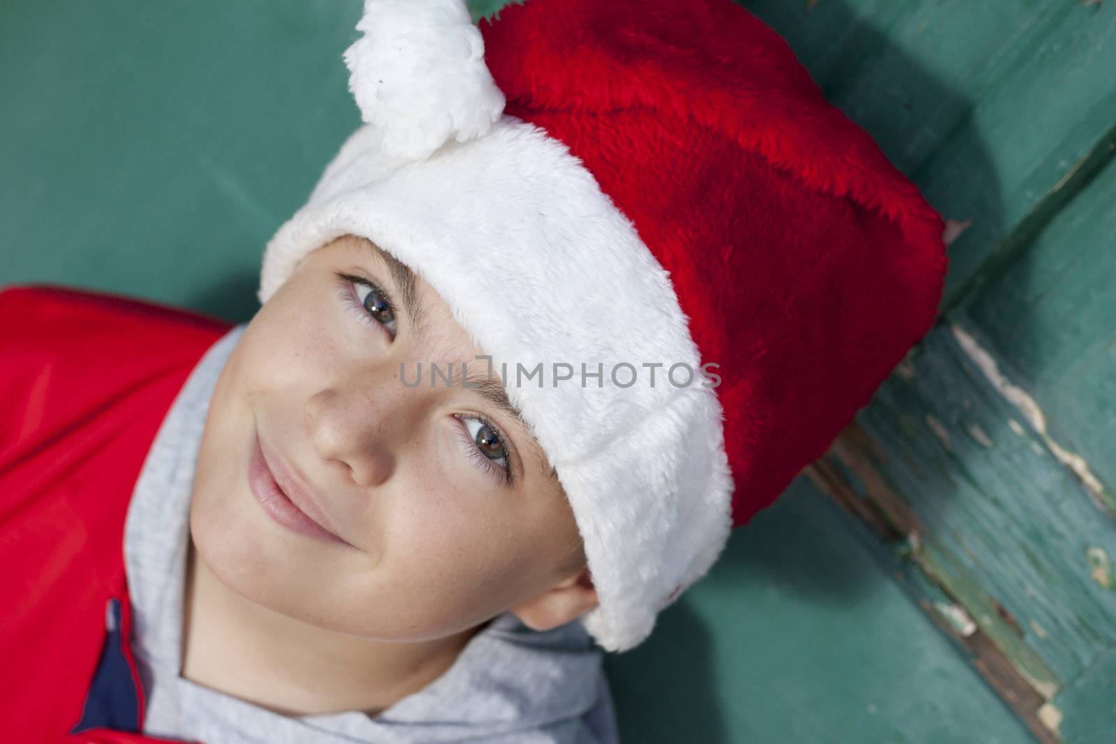 Boy in red santa hat