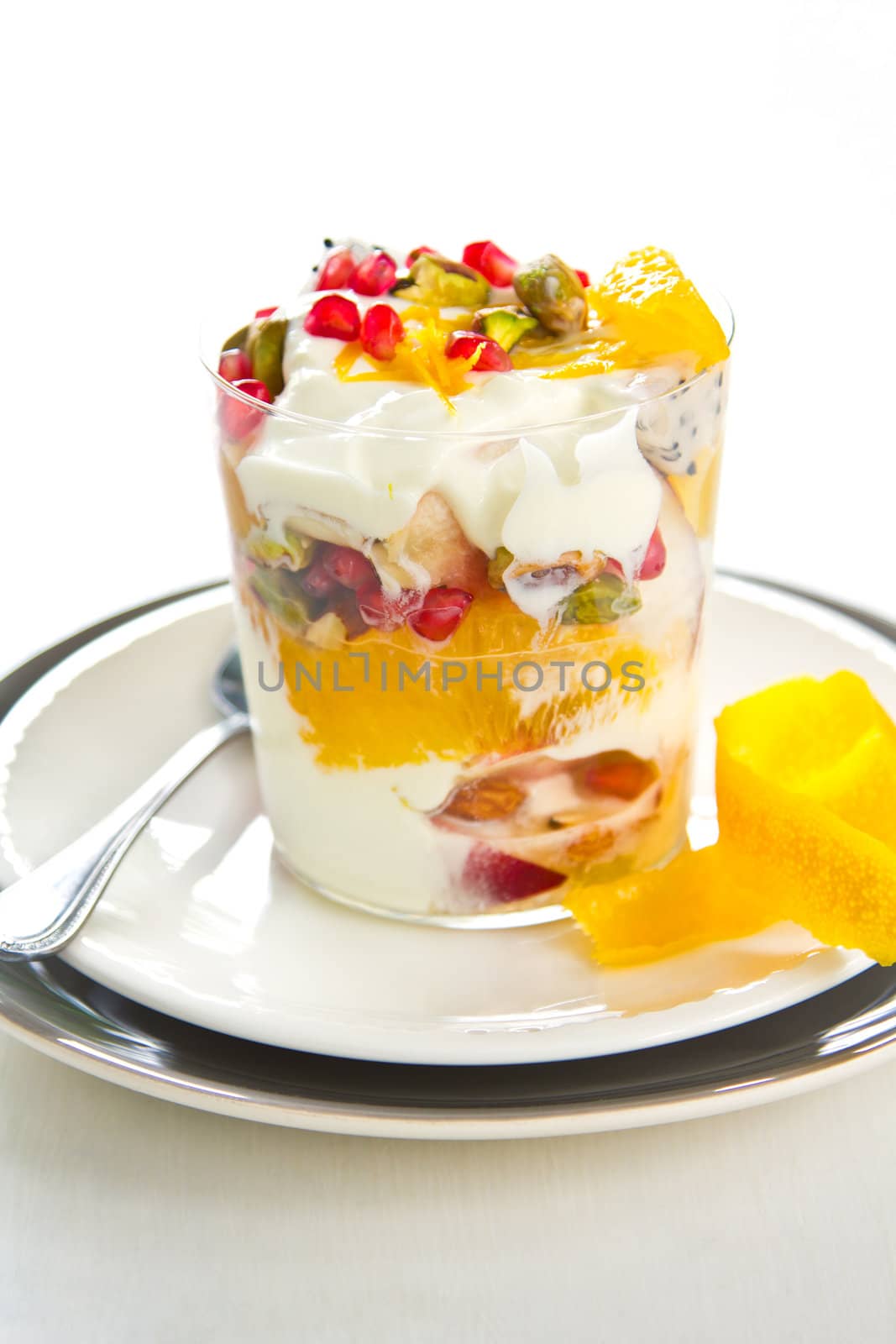 Varieties of fruits and nut with Greek yogurt [Orange,Peach,Pomegranate,Dragon fruit ]