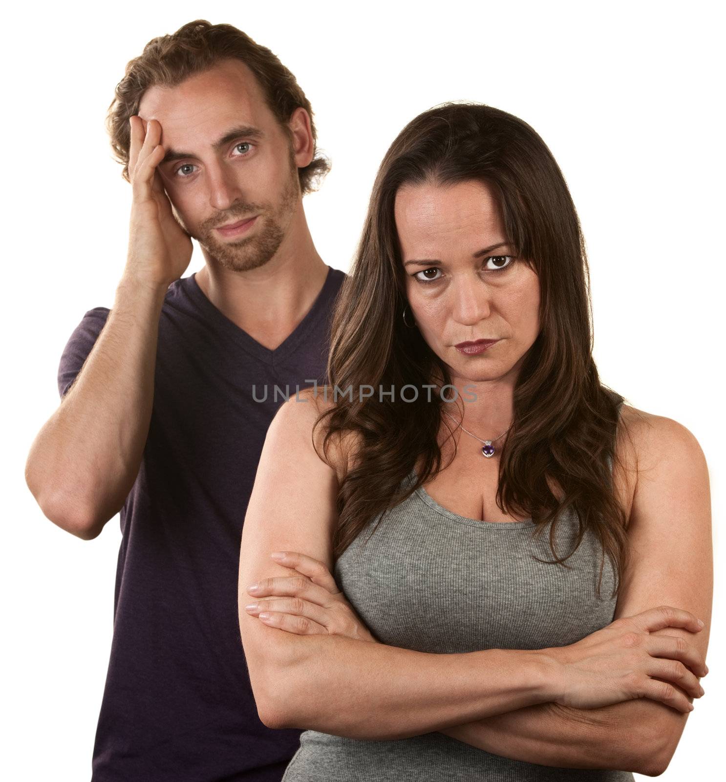 Skeptical European woman and man in with hand on head