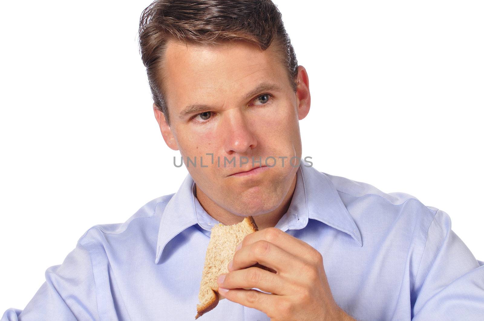 Closeup of man eating a sandwich on white background