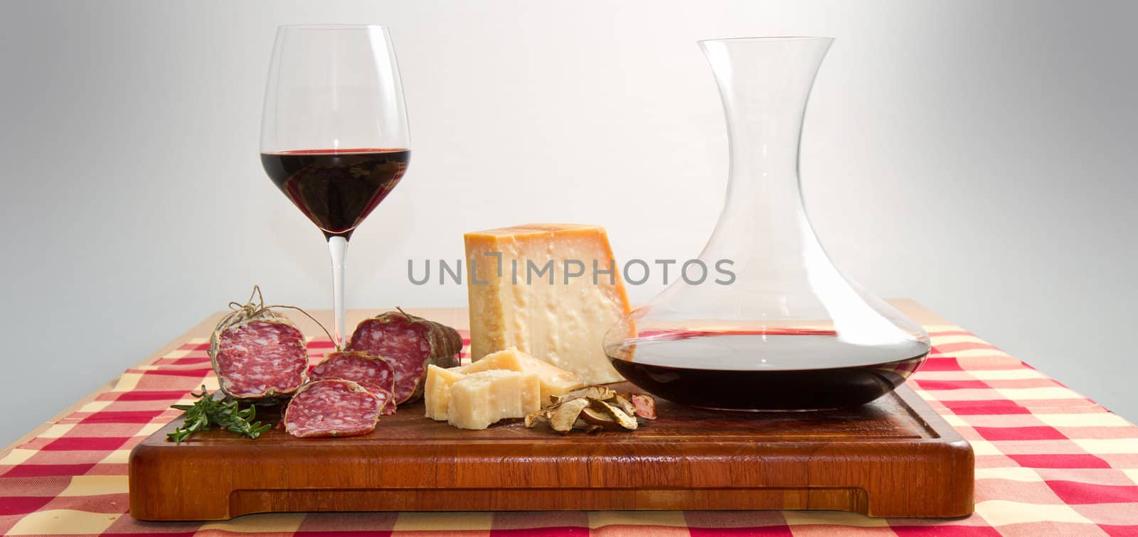 bread parmesan cheese  salami and wine by lsantilli