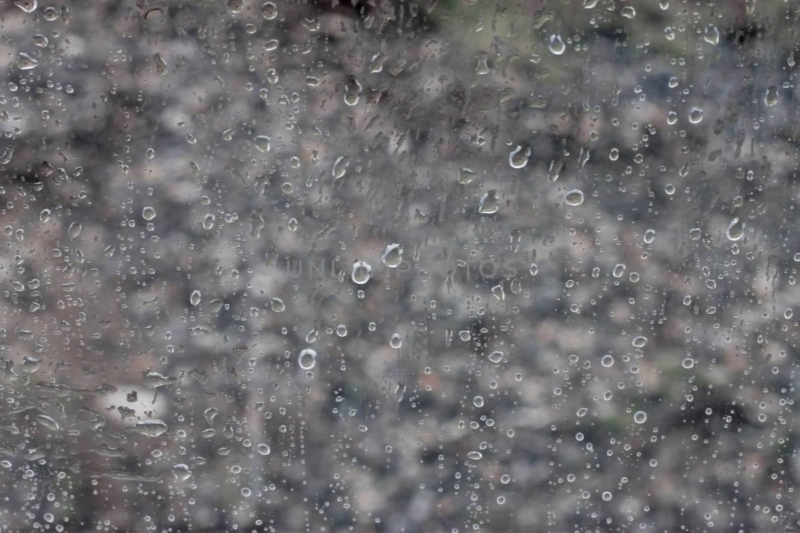 Water drops on window glass after rain