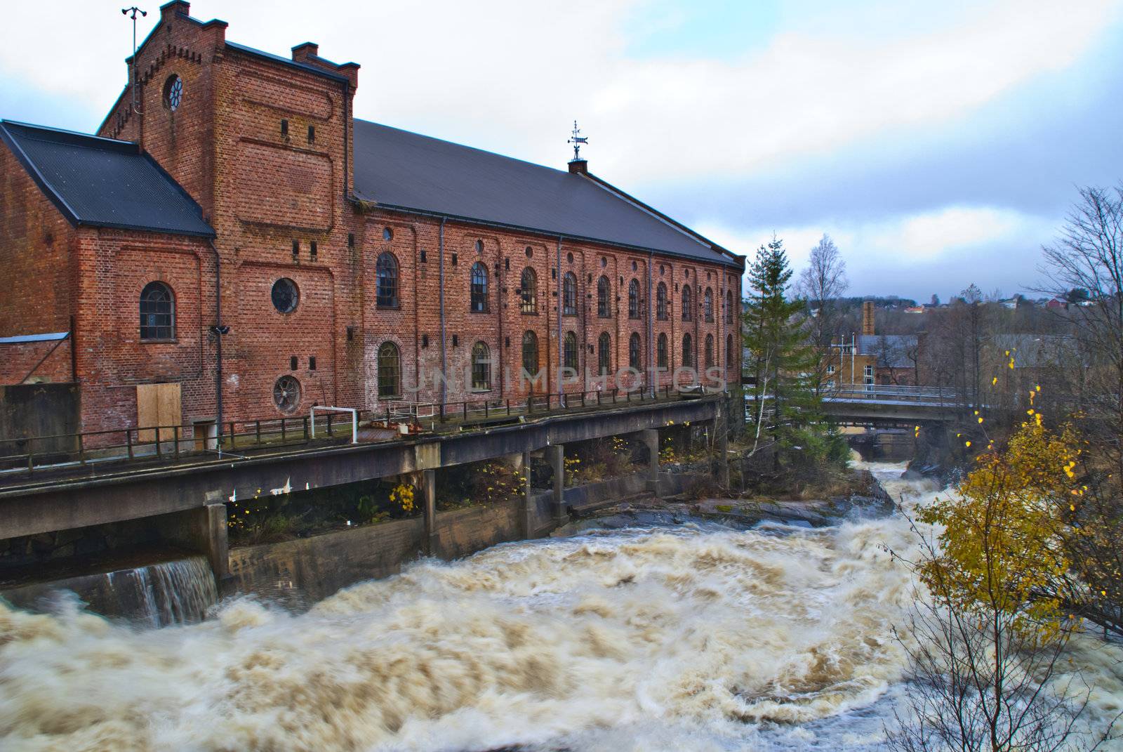 The filter station is northern rurope's larges of its kind and is based on automatic self flushing rotary drum, the filter is built into existing pools in the basement of a pulp mill factory originally from 1885, the filter station is located at tistedal in halden, image is shot in november 2012
