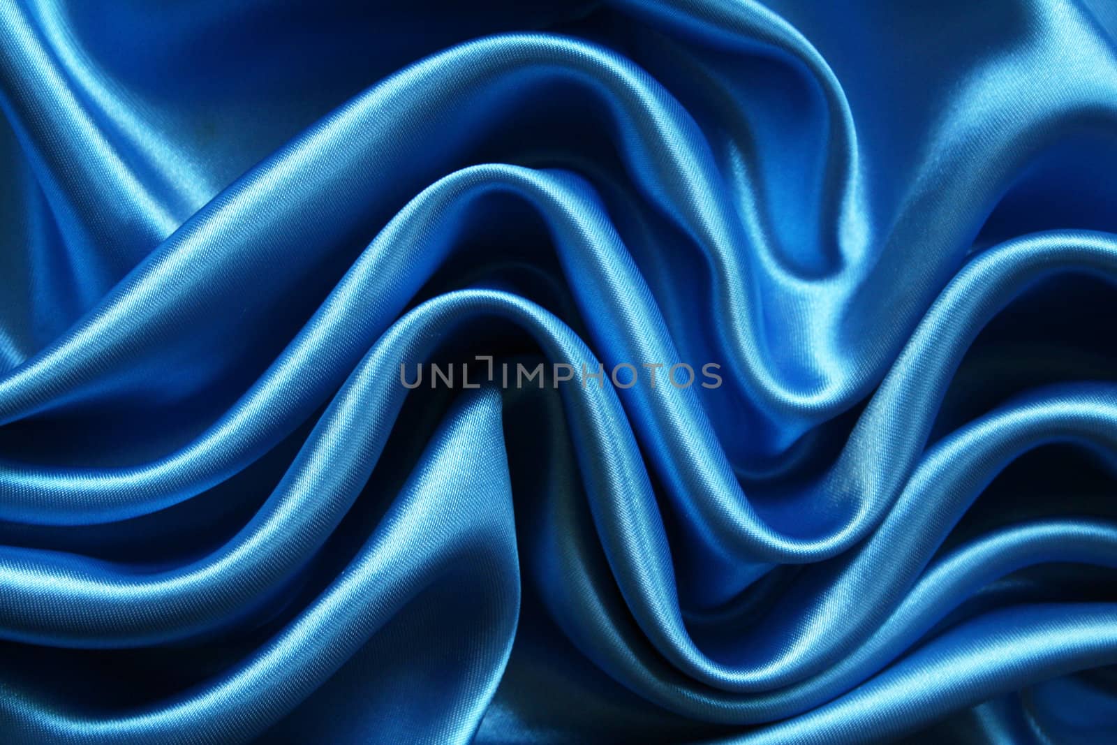 Smooth elegant dark blue silk can use as background 