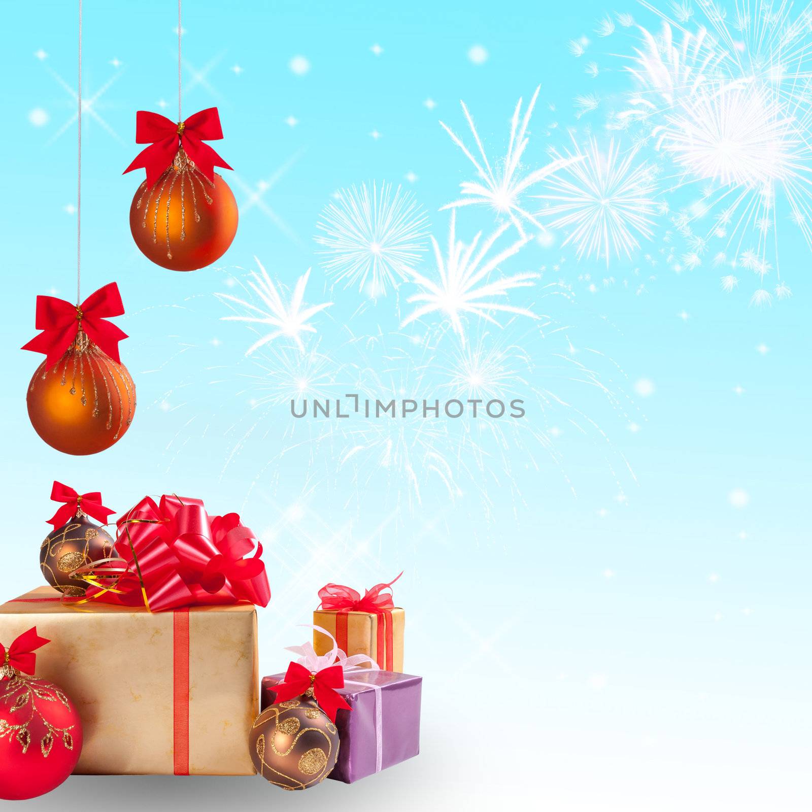 Christmas gift and balls with snow on festive background