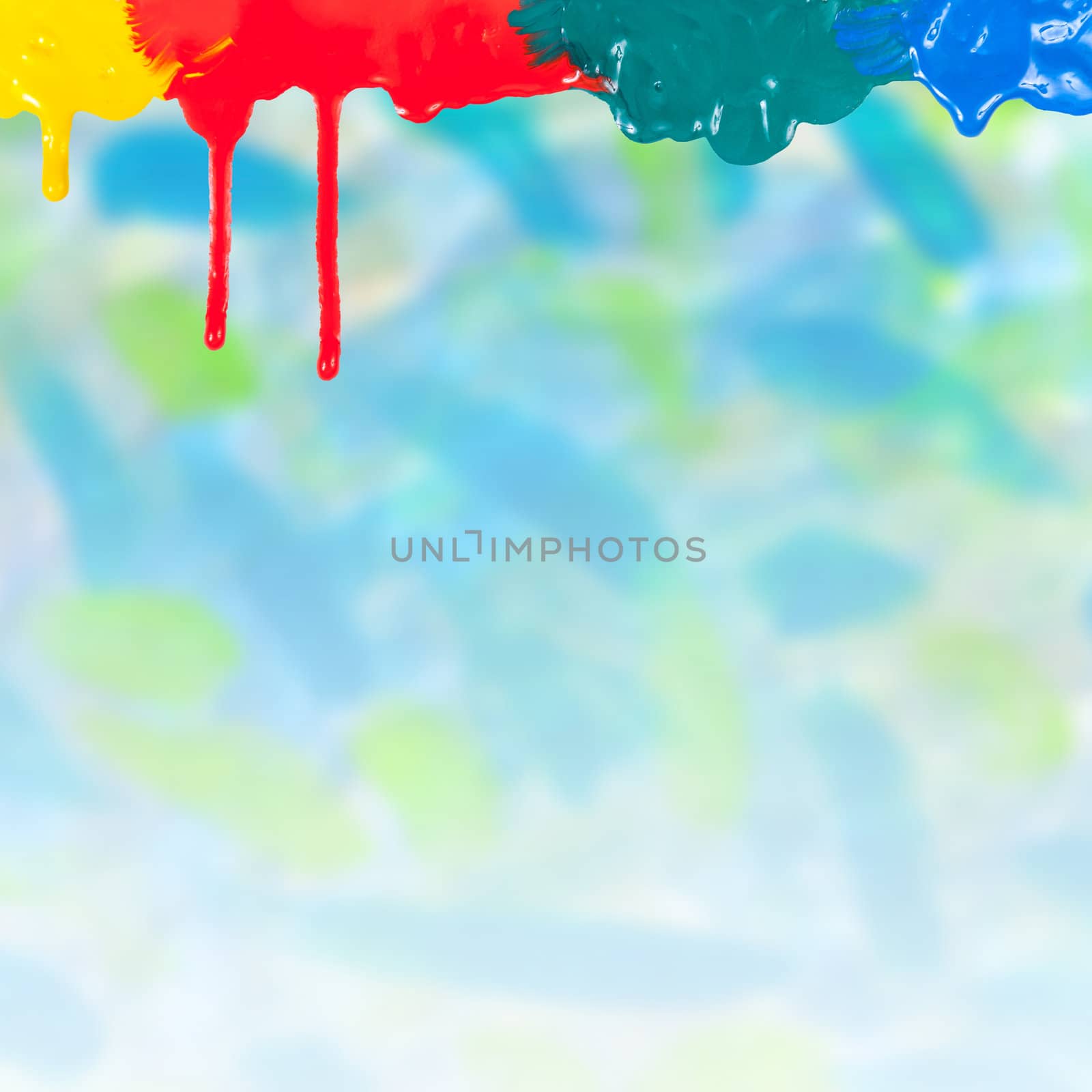 Abstract paints dripping on colorful background