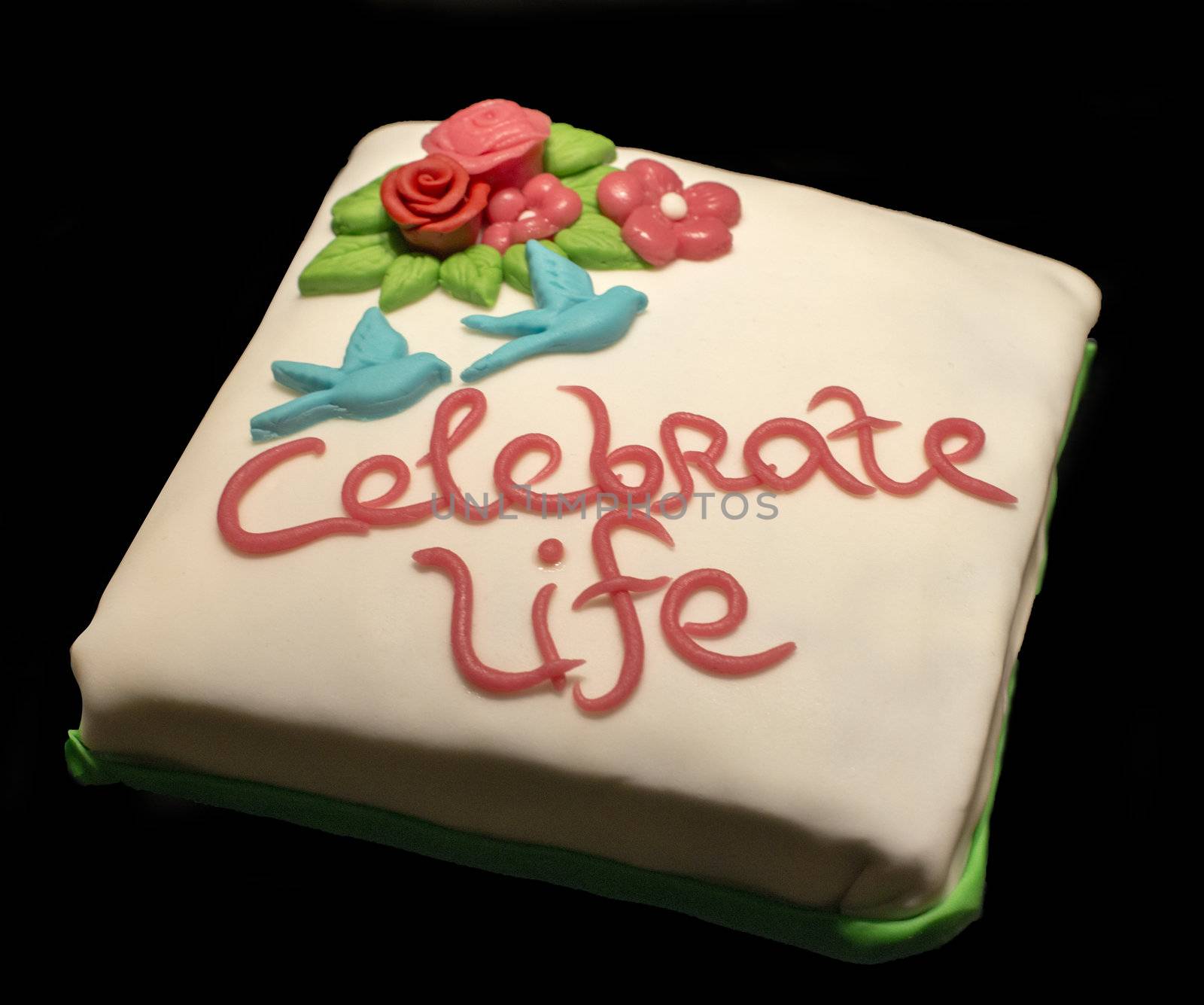 celebrate life cake on black background