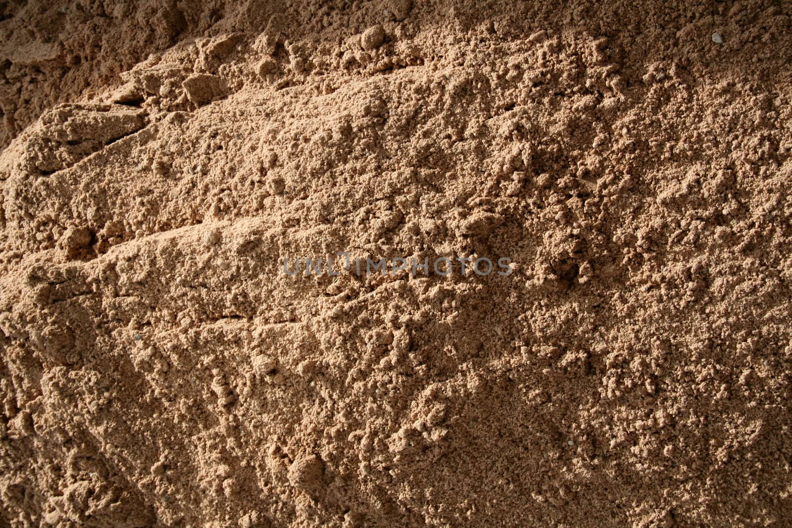 Fine sand brown natural terrain texture background