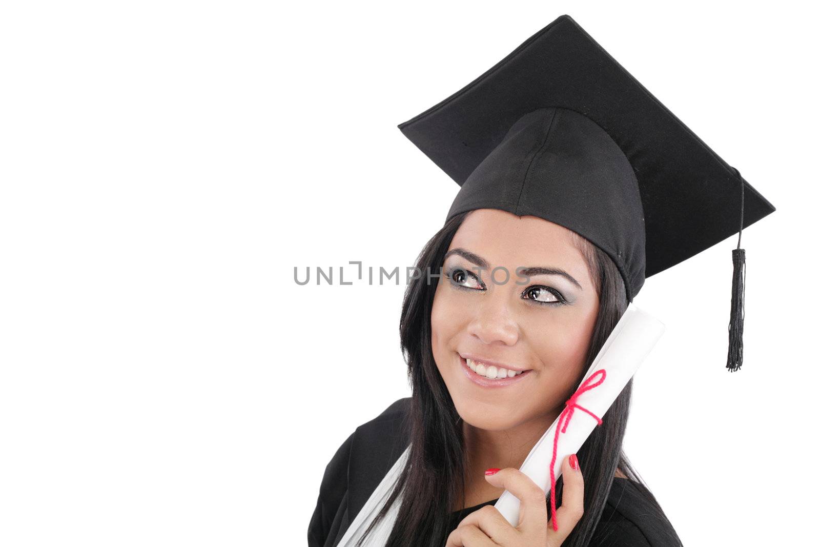 Thoughtful graduation woman with diploma looking on copy space by dacasdo