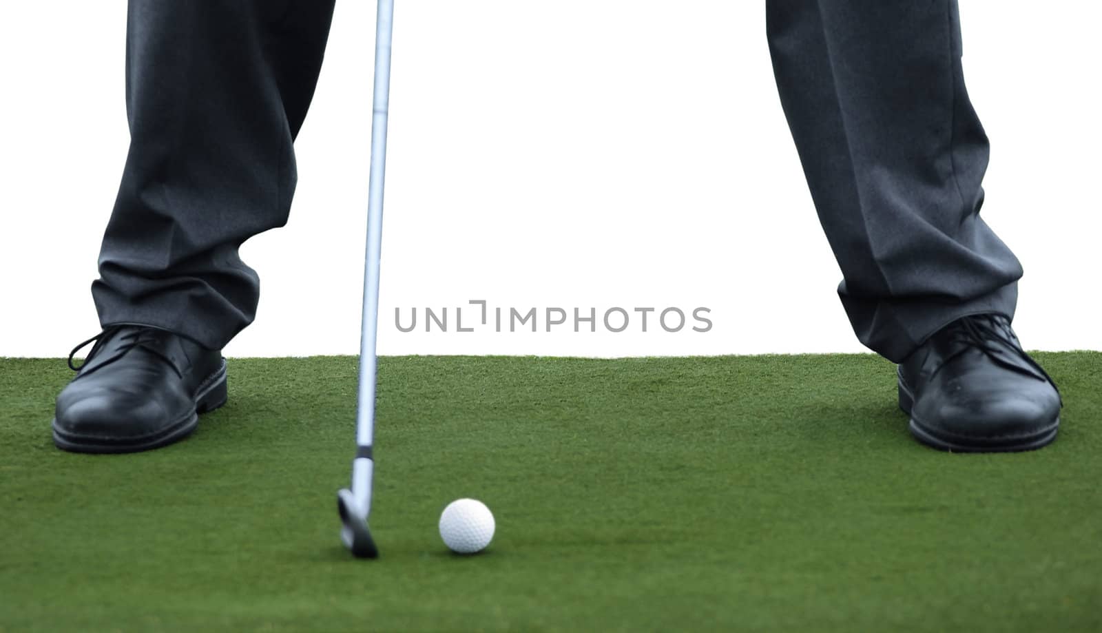 golf stance on green carpet by studio023