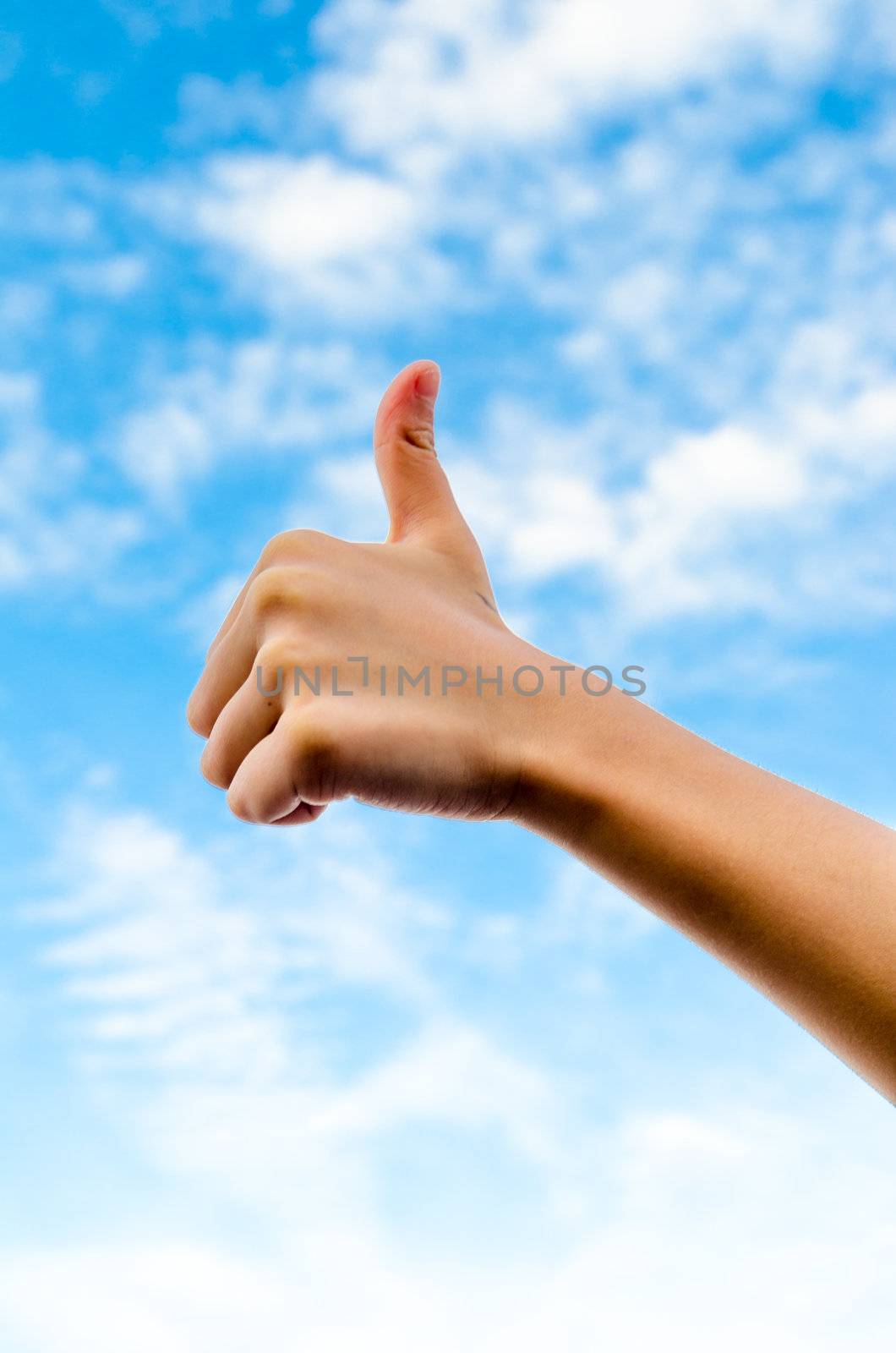 Hand and finger isolated on blue sky