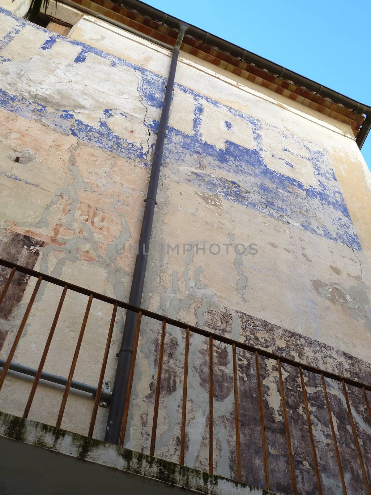 old distressed wall with advertisement