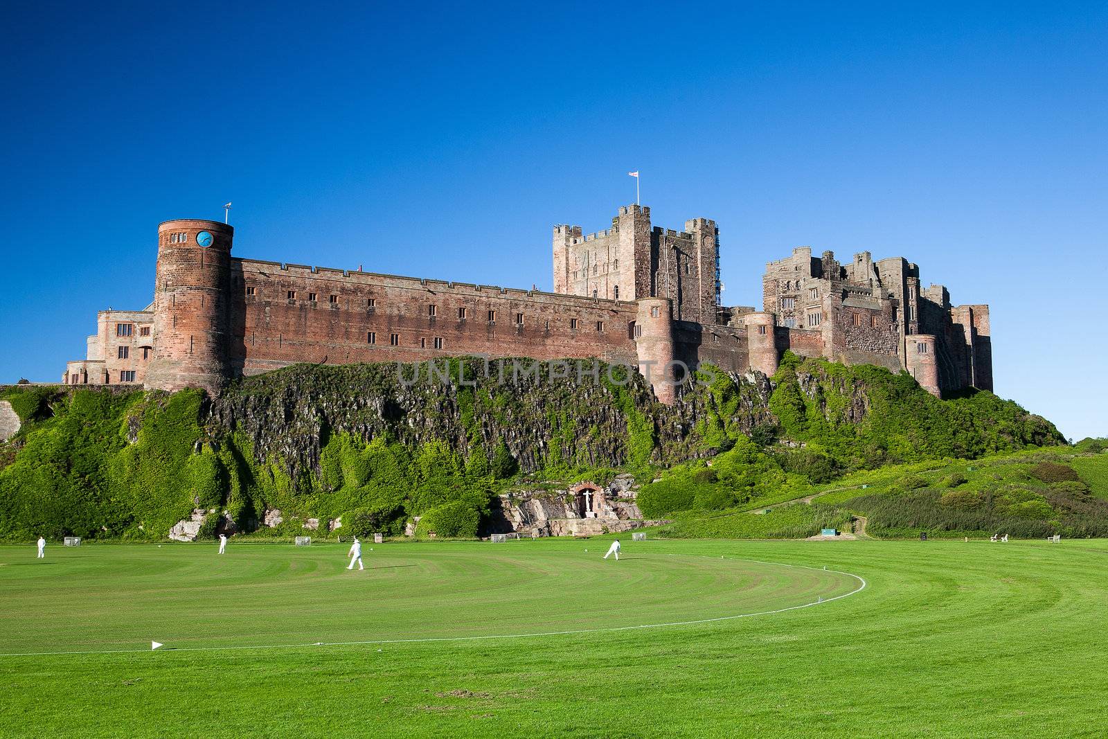 Bamburgh Castle and cricket course by CaptureLight