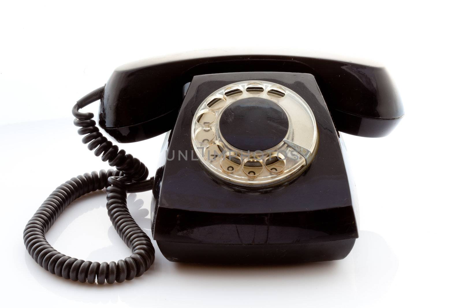 Retro rotary phone on a light background