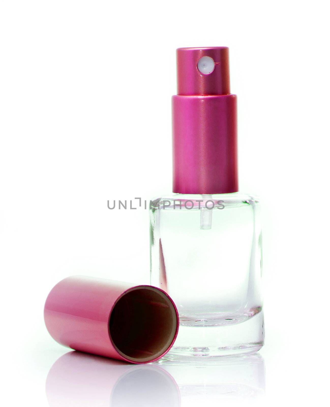 empty red glass perfume bottle on a white backgroung