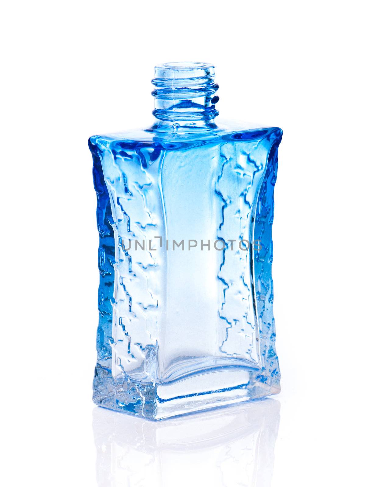 blue glass perfume bottle on a white backgroung