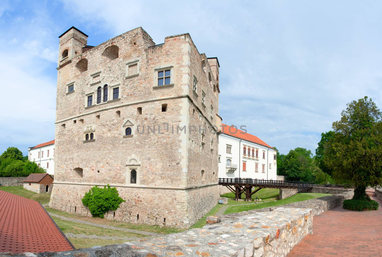 Medieval aged stone royal castle and fortress by noble family Rakoczi in Sarospatak, Borsod-Abauj-Zemplen Country, Hungary on the blue sky background