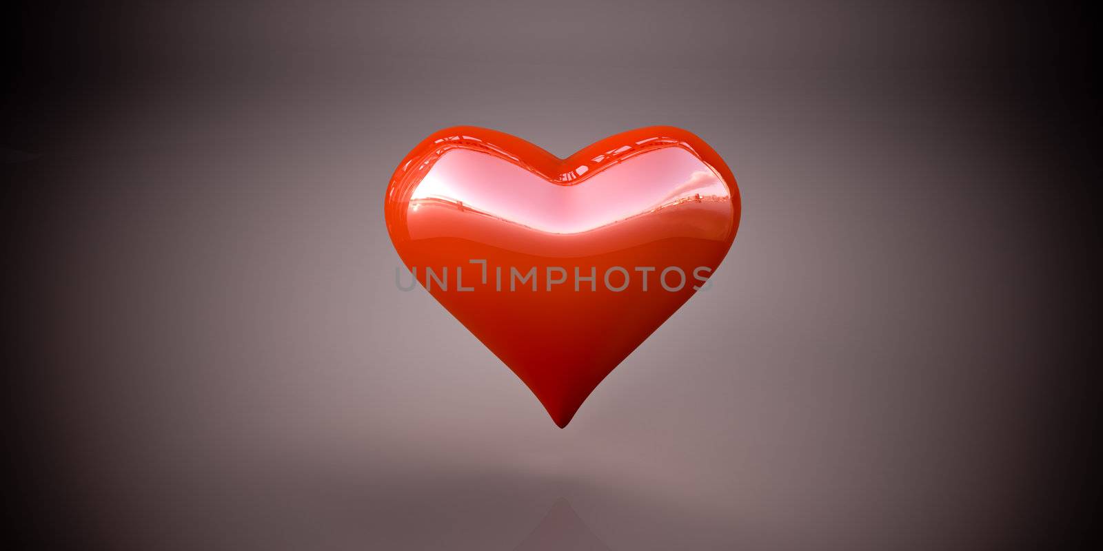 Shiny red heart on a dark gray background, vignetting