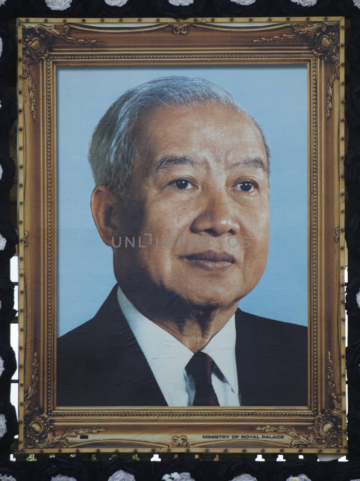 Phnom Penh - November 10 : Big portrait  of former king of Cambodia  Norodom Sihanouk  hang on the front of the Royal Palace  in Phnom Phen Cambodia on November 10 2012