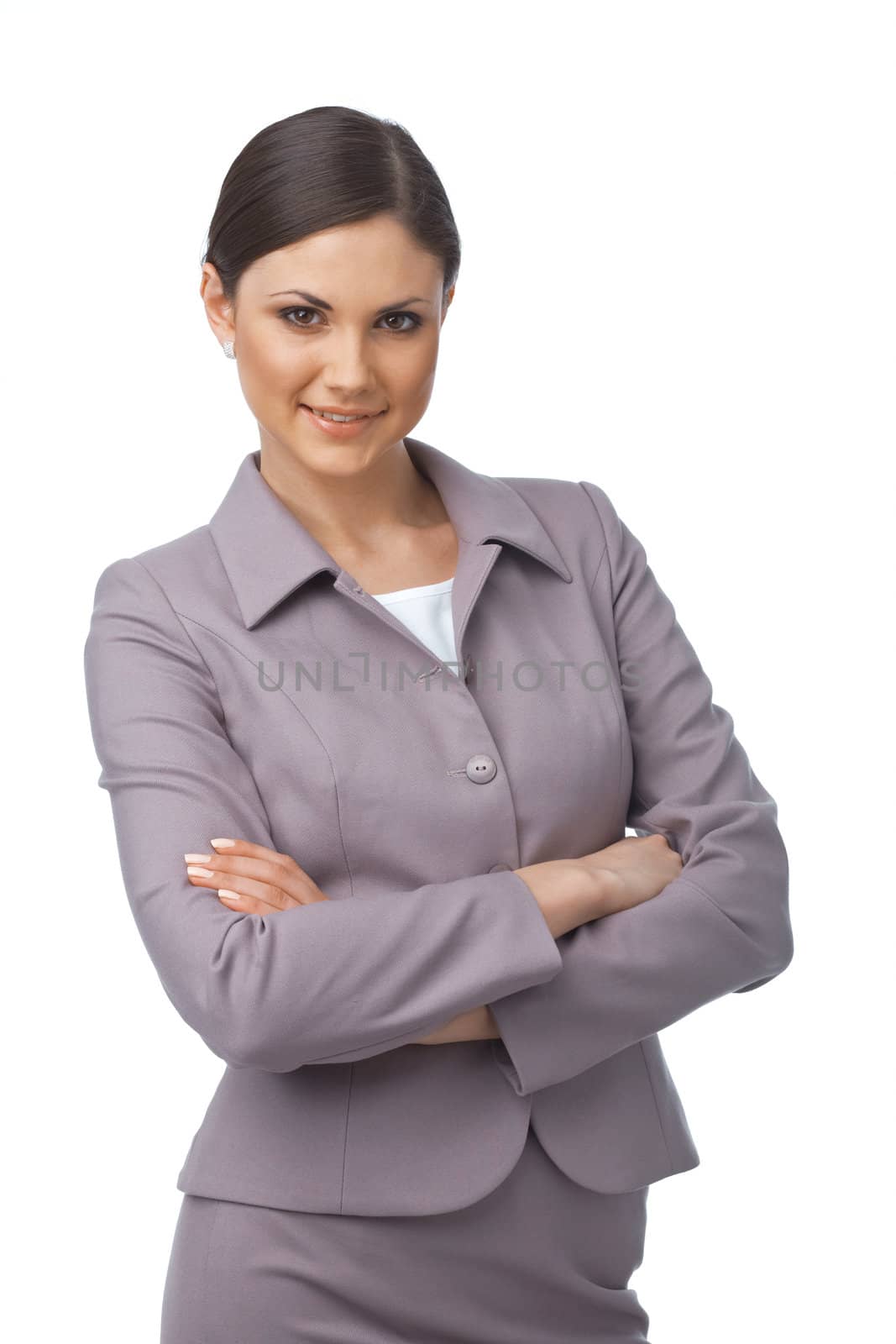  Pretty young business woman with hands folded looking at you on white background 