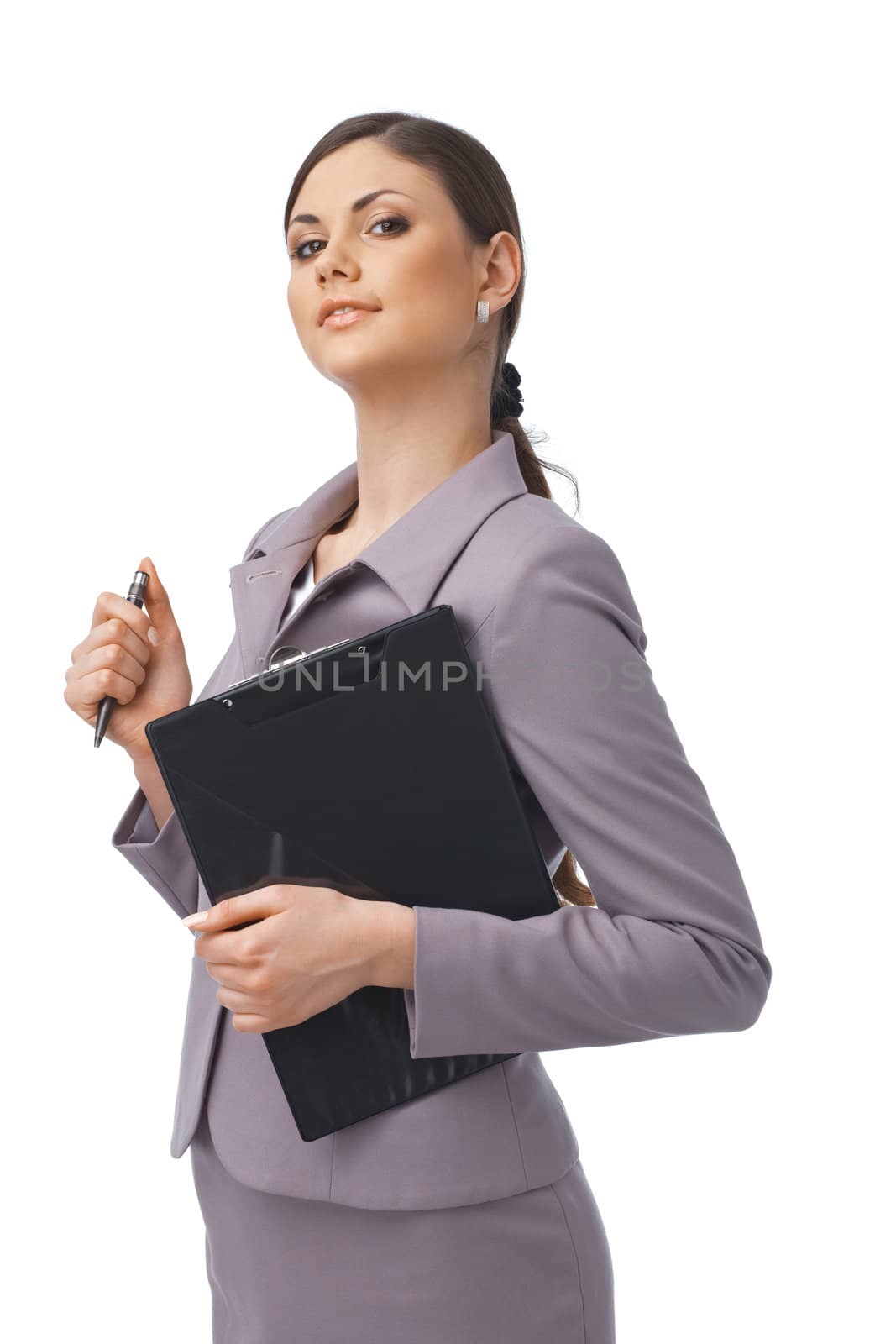 Portrait of a young confident businesswoman holding a clipboard and a pen