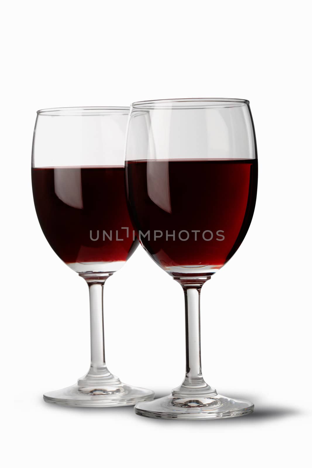 Two red wine glasses by romanshyshak