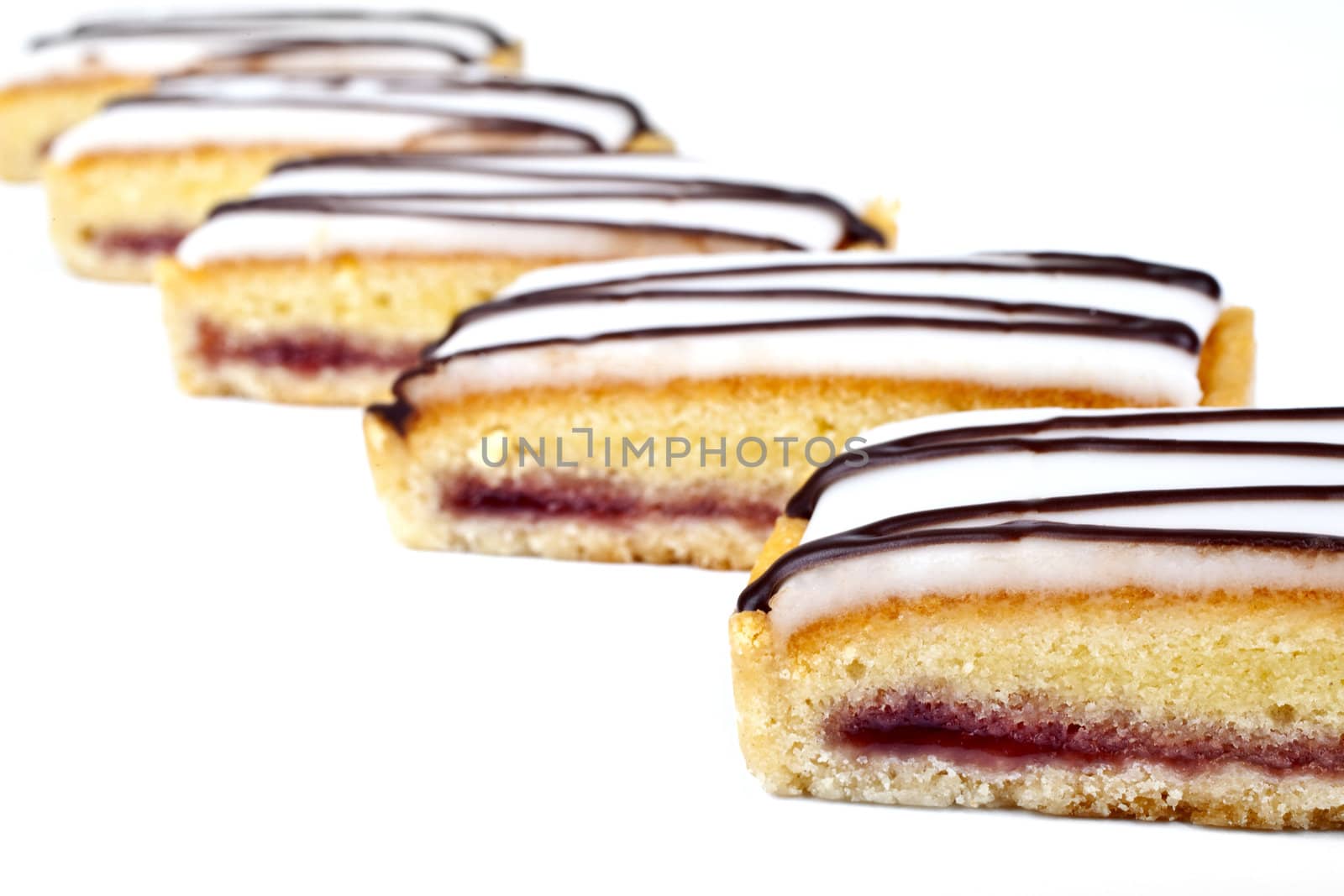 Cherry Bakewell Slices over a white background.