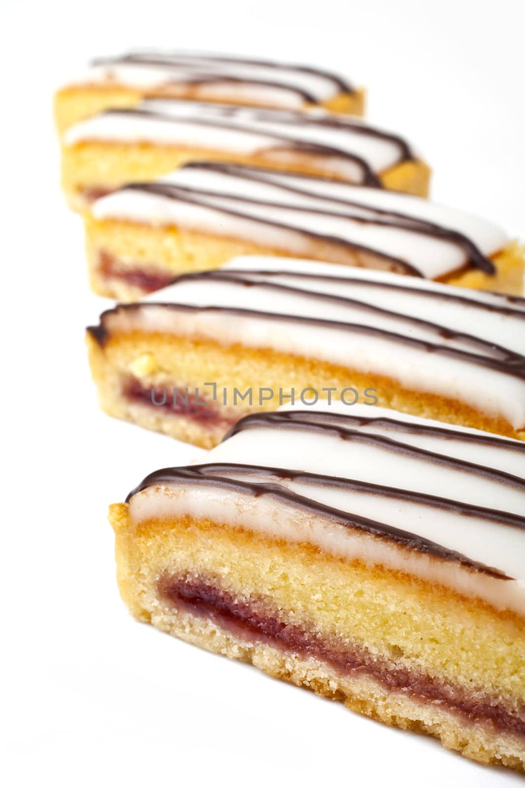 Cherry Bakewell Slices over a white background.