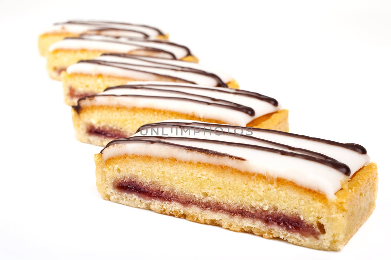 Cherry Bakewell Slices over a white background.