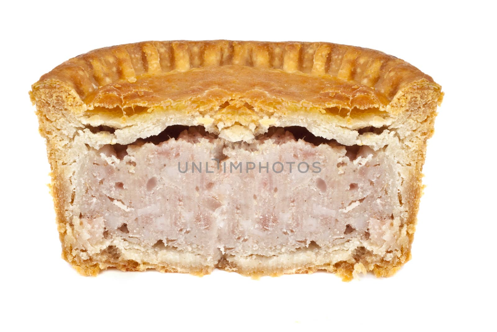 A Pork Pie half over a white background.