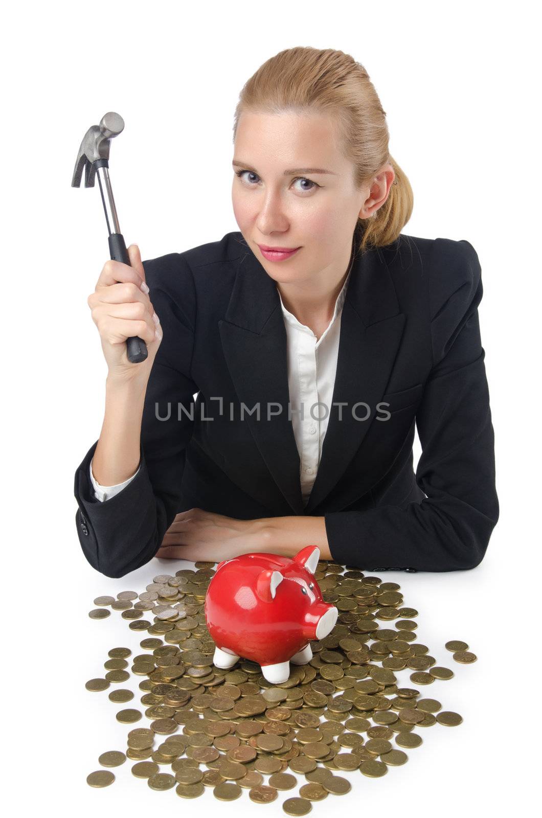 Woman breaking piggy bank for savings