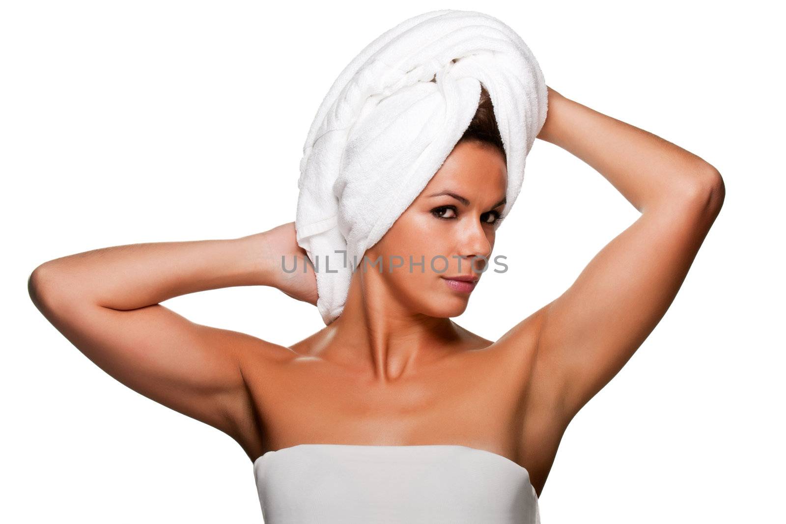 Woman with a towel around her head, isolated on a white background