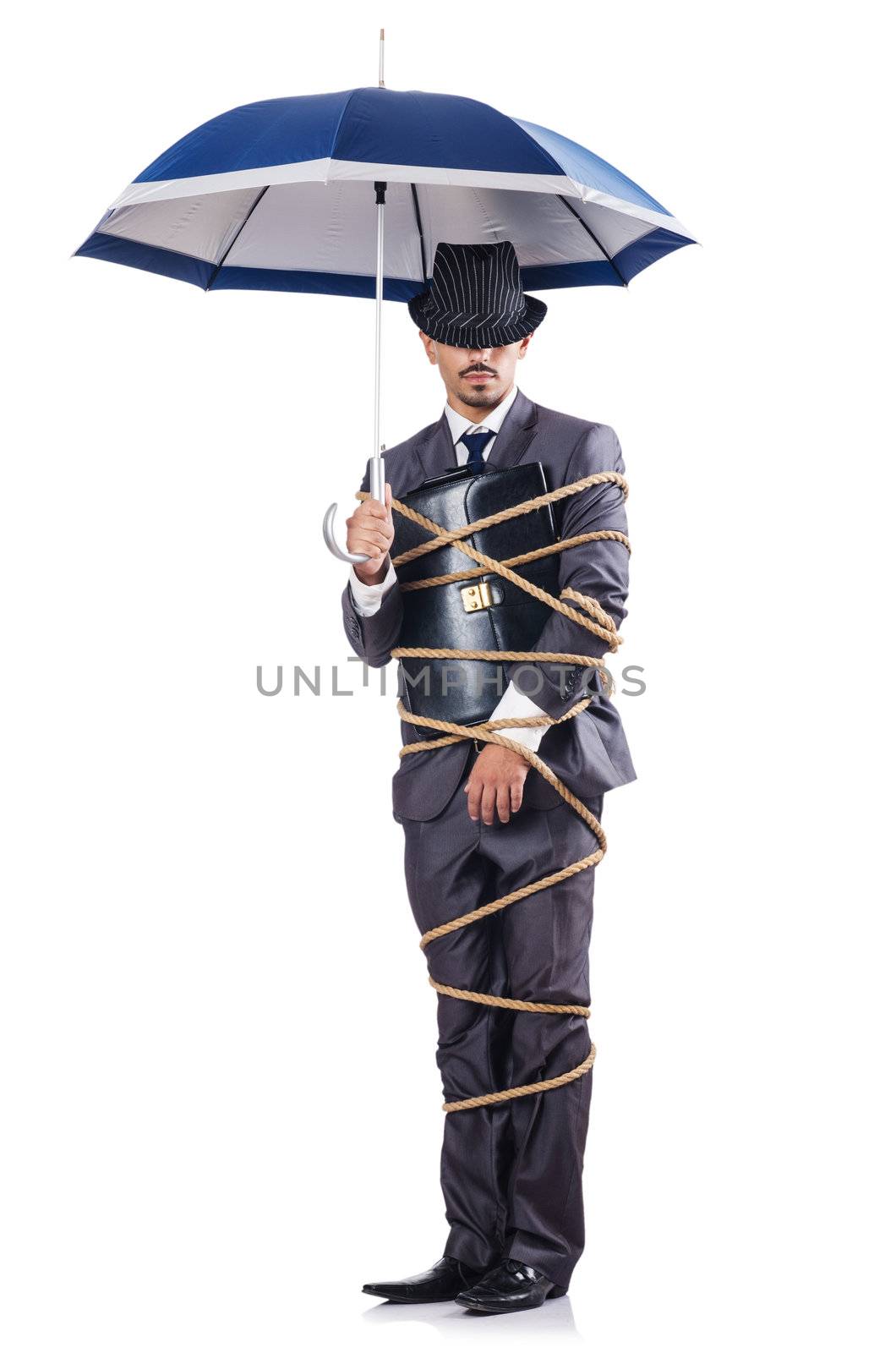 Businessman tied up with rope