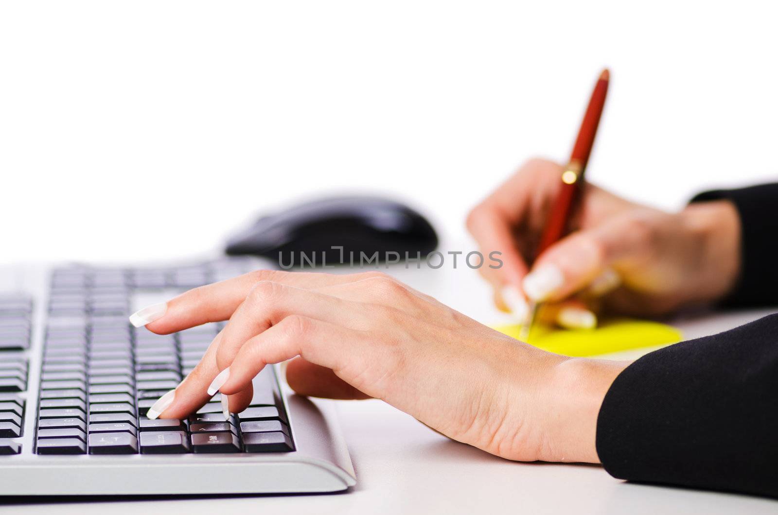 Hands working on the keyboard