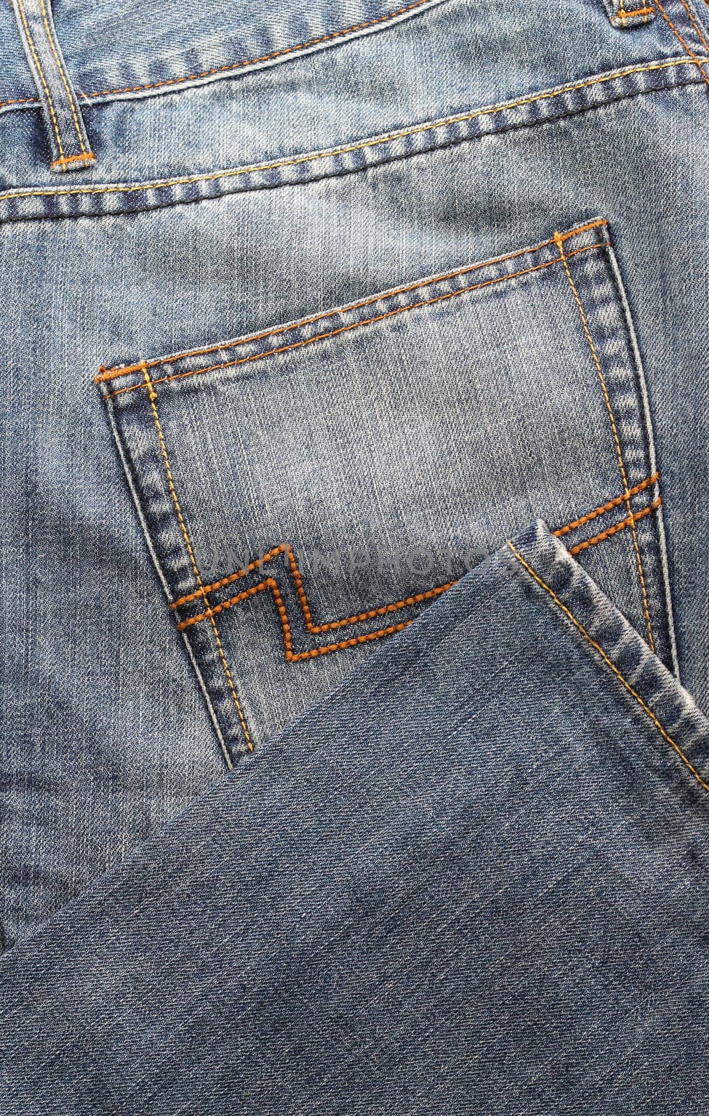 textured blue jeans pocket at the back