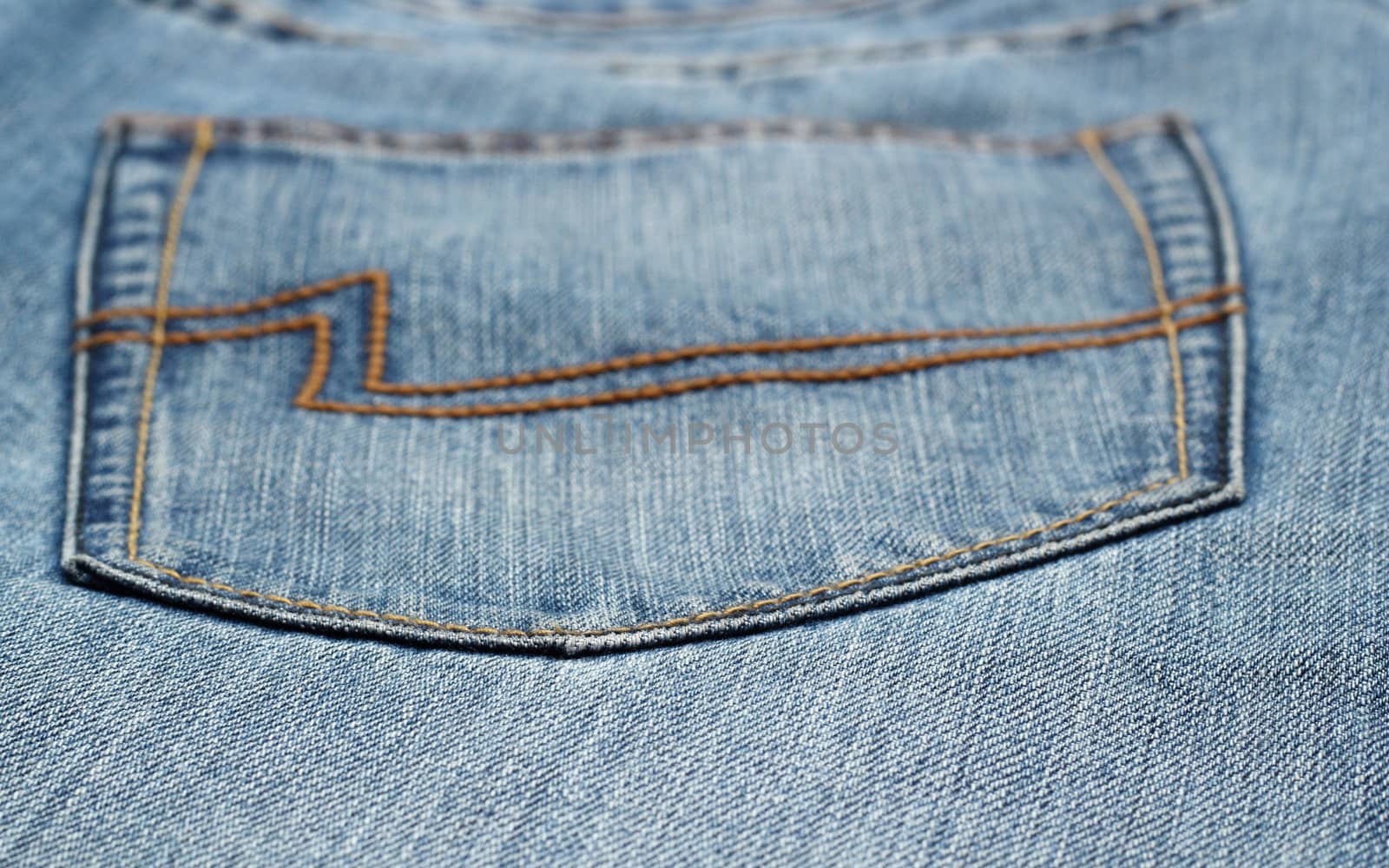 closeup of blue jeans pocket - abstract view shallow dof