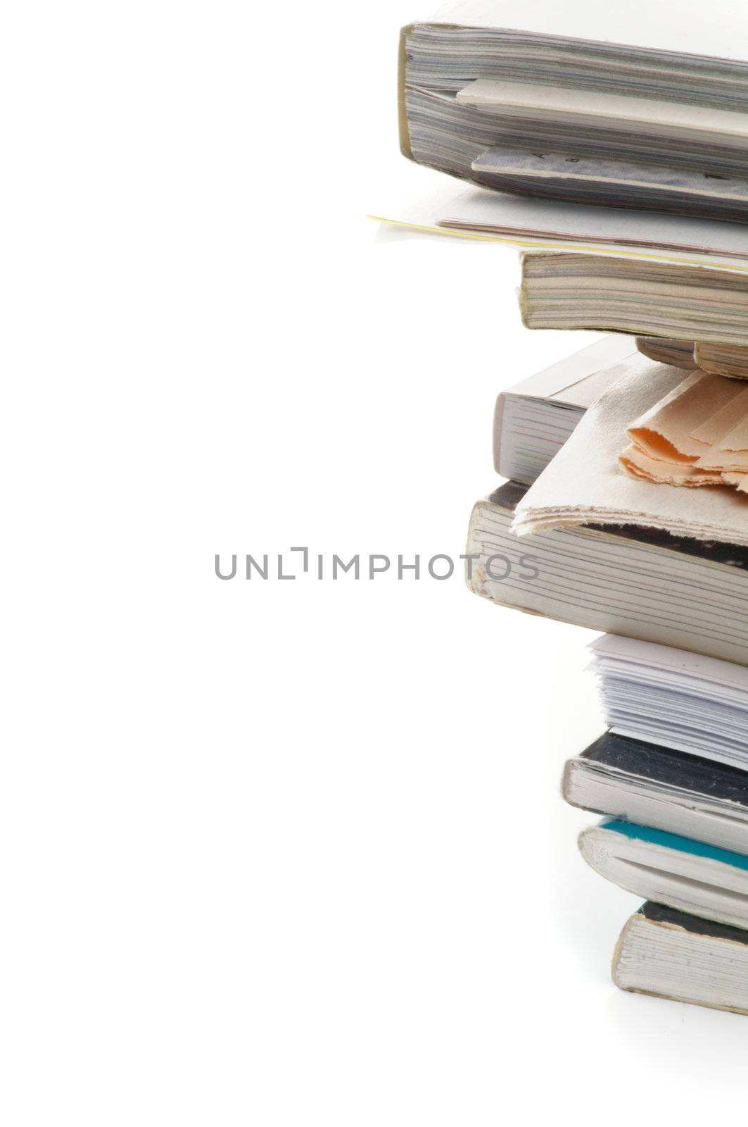Stack of Magazines and Newspapers as Frame closeup on white background